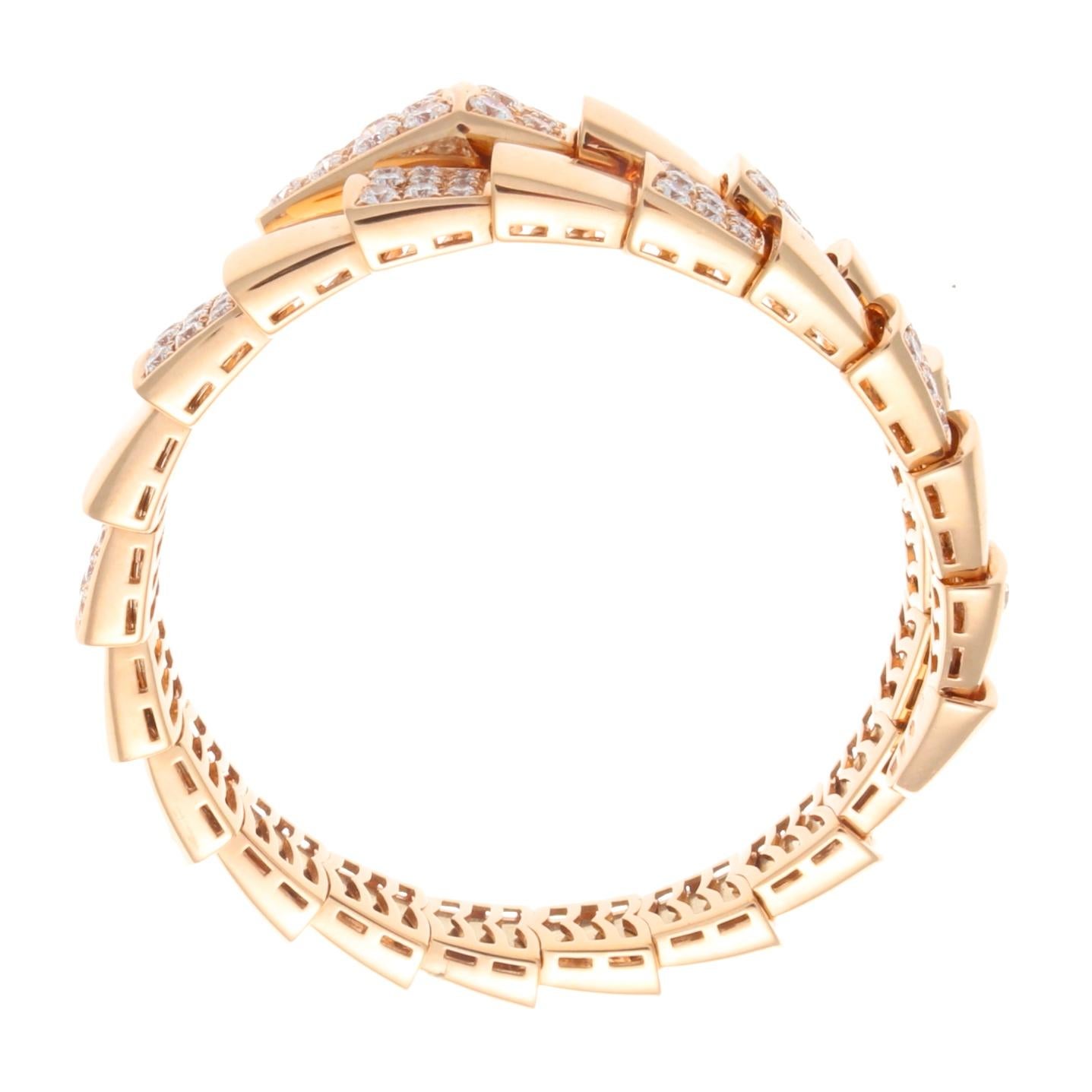A historic motif representing wisdom, vitality and seduction dating back to ancient Greek and Roman mythology, the iconic Bulgari serpent. Designed in glistening 18k rose gold,  embedded with approximately 3.50 carats of collection super white, VVS,