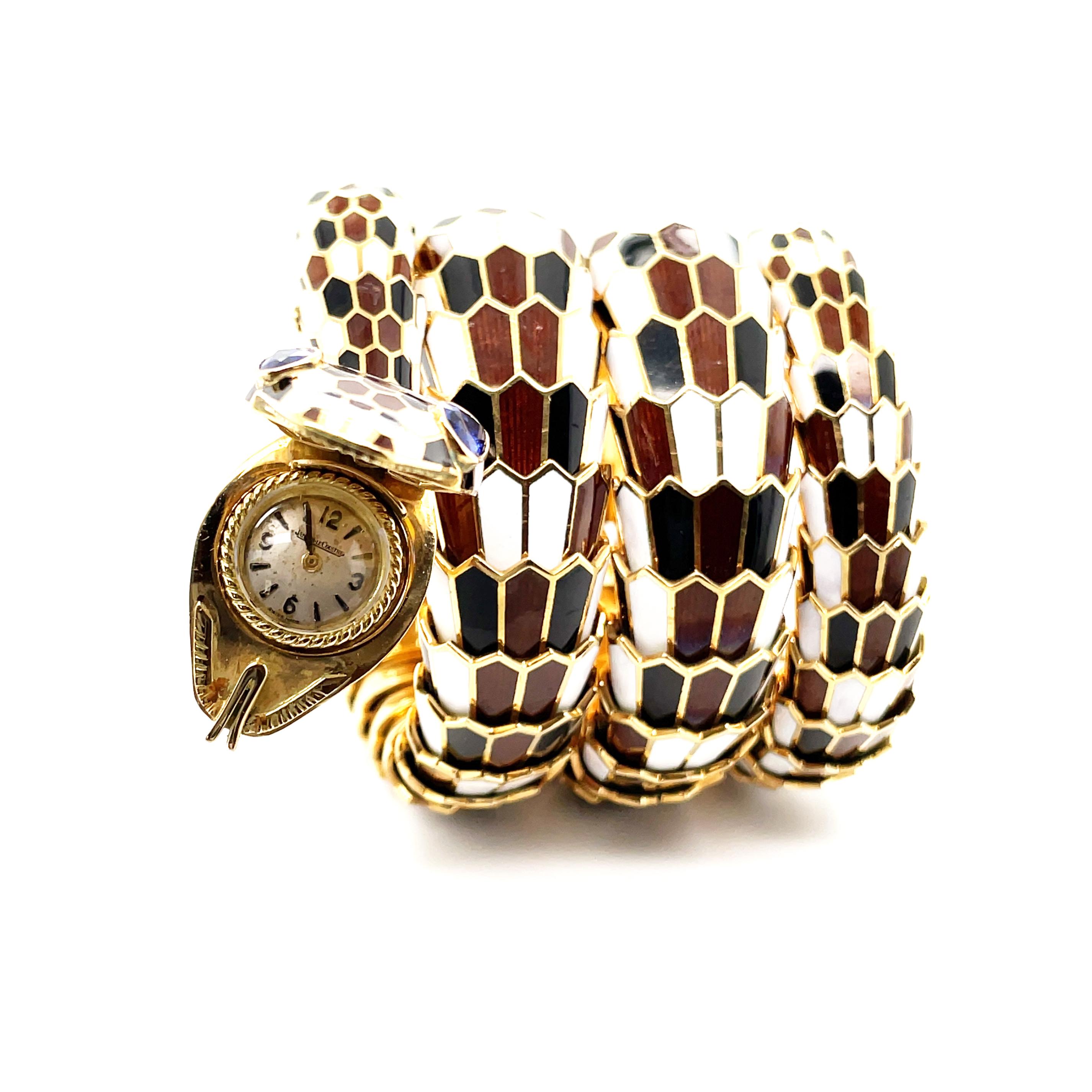 Bulgari Serpenti Watch in Multi-Colored Enamel, Jaeger Le Coultre, ca. 1970s

An iconic Serpenti 18k gold watch bracelet by Bulgari from the 1970s with a Jaeger Le Coultre watch.
The scales of the flexible snake are in various skin colored enamel