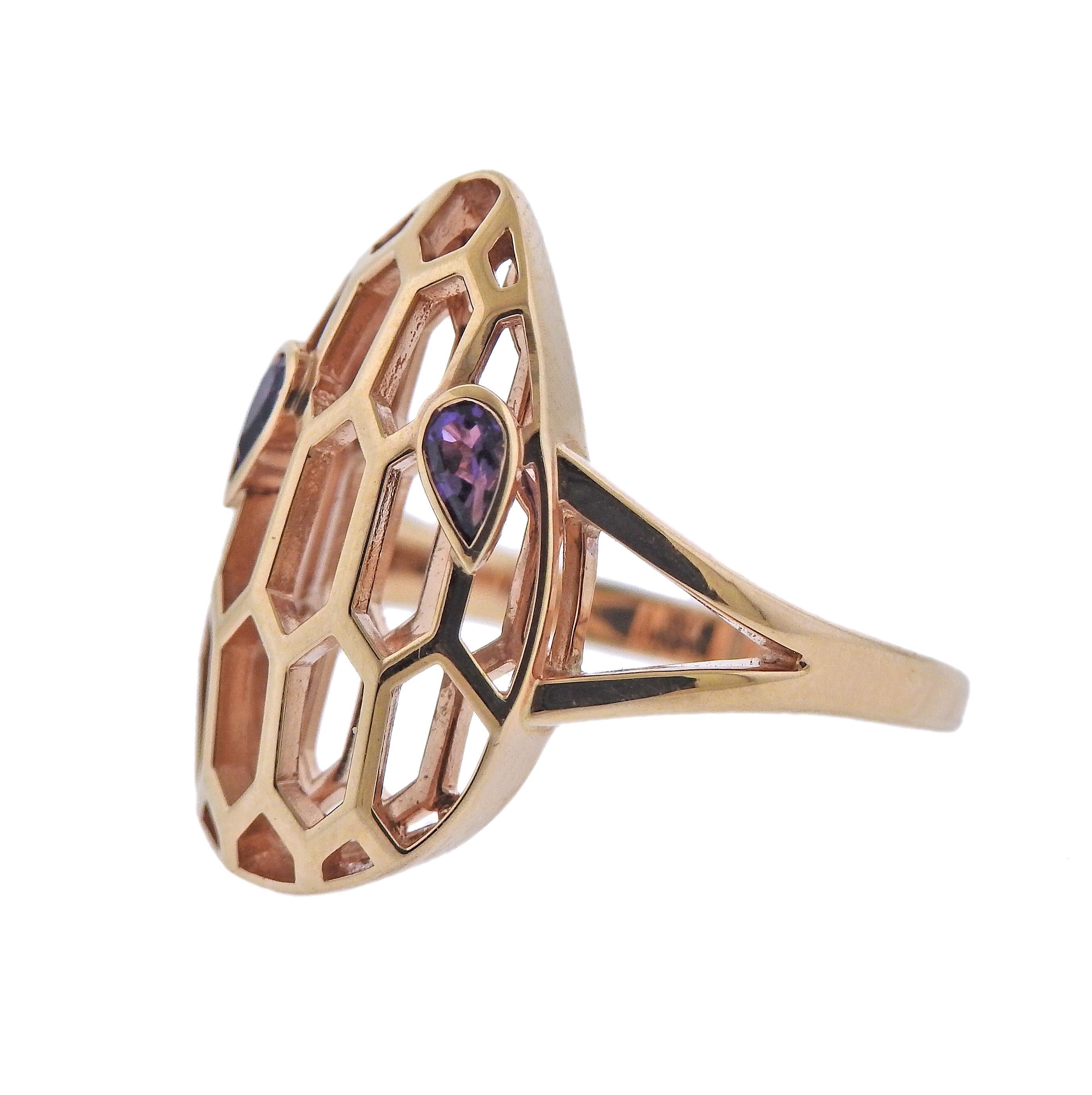 Bulgari 18k rose gold Serpenti ring with amethyst eyes. Ring is available in sizes 6 and 6.75. Top of the ring measures 21mm x 14mm. Marked:  Bvlgari, Au750, 2337AL, made in Italy, Serial #. Weight is 5.9 grams. Retail $2040, comes with box and COA.
