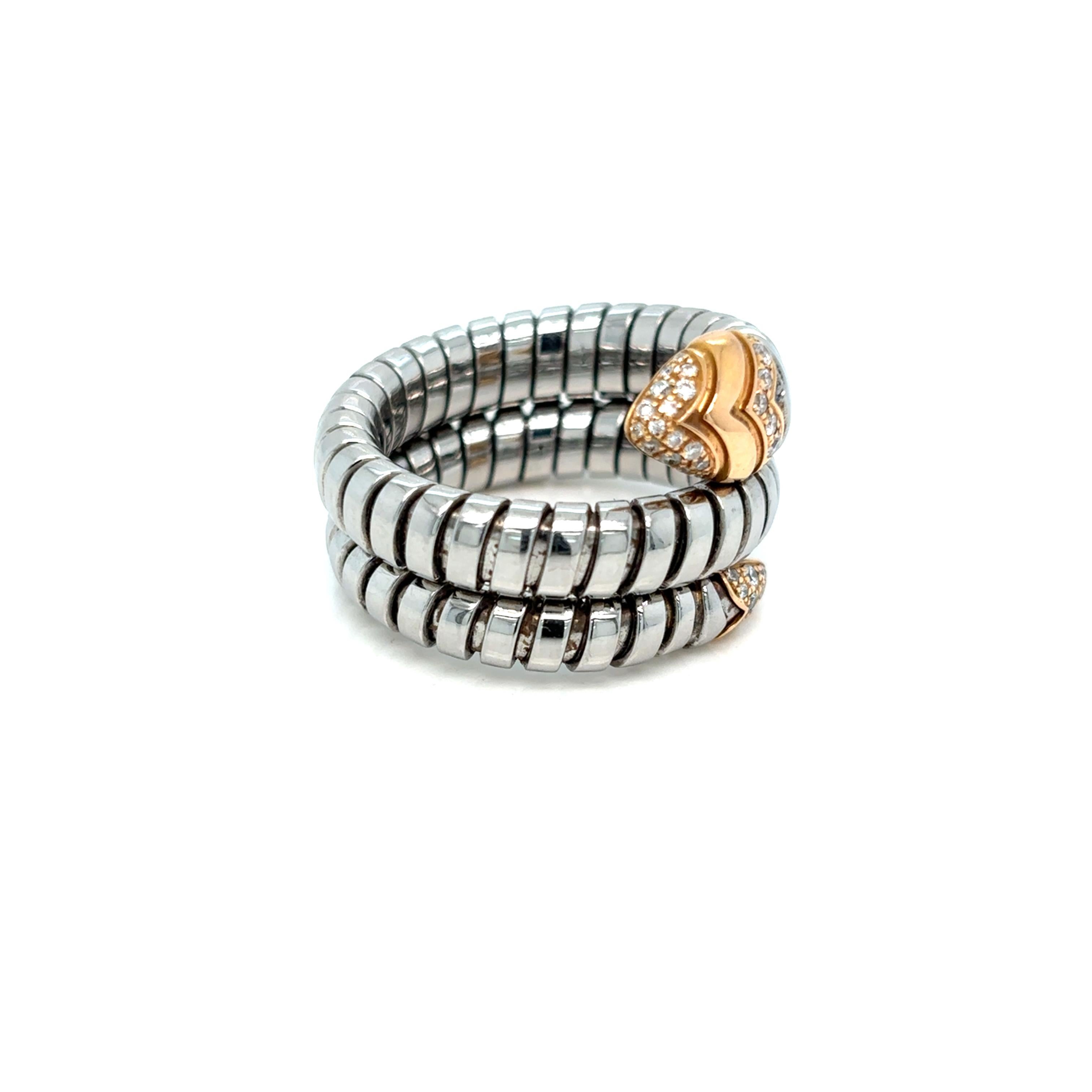 A striking creation from Bulgari’s iconic Serpenti collection, this Tubogas ring coils sensually around the finger, echoing the sinuous form of a serpent. Crafted in polished stainless steel and 18k rose gold, the piece is enriched with pavé-set