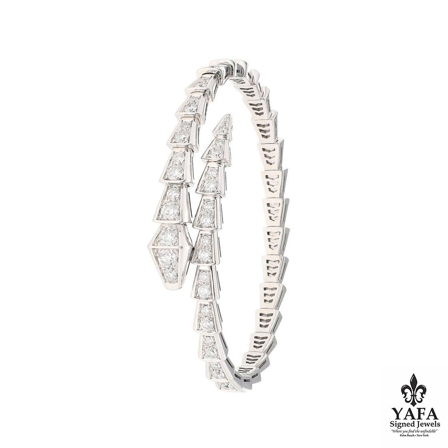 Part of Bvlgari's iconic Serpenti collection representing wisdom, vitality, and seduction. The Bvlgari Serpenti Viper one-coil slim bracelet in 18k white gold, set with pave diamonds. 
Size: Medium
Signed Bulgari

Vintage and Estate Collection