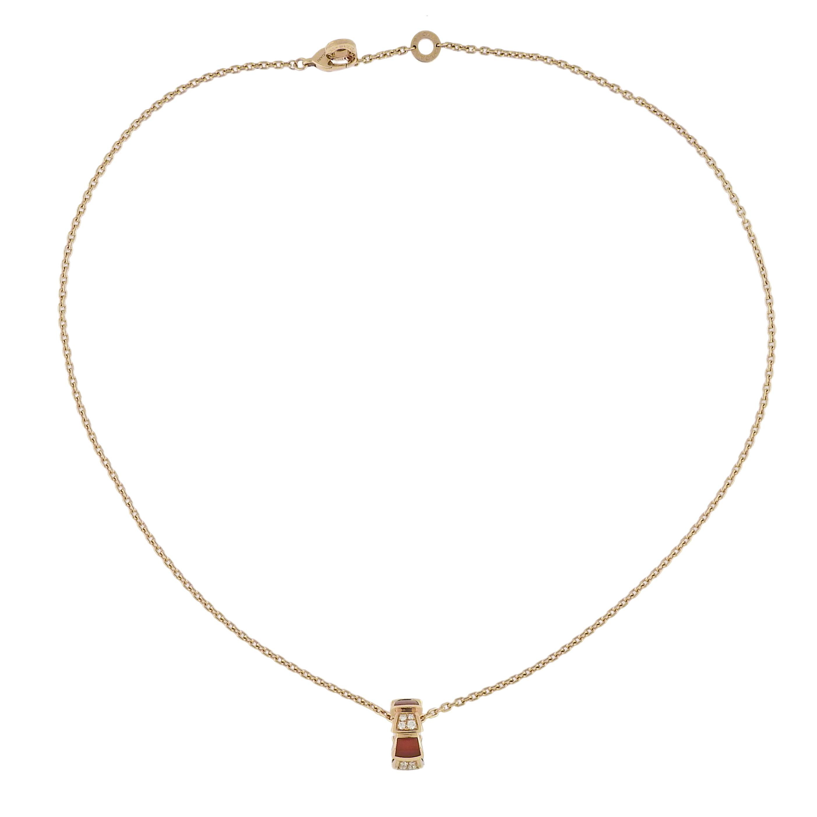 18k rose gold Serpenti Viper pendant necklace by Bvlgari, with 0.21ctw G/VS diamonds and carnelian. Retail $5550. Comes with COA and box. Necklace is 17.25