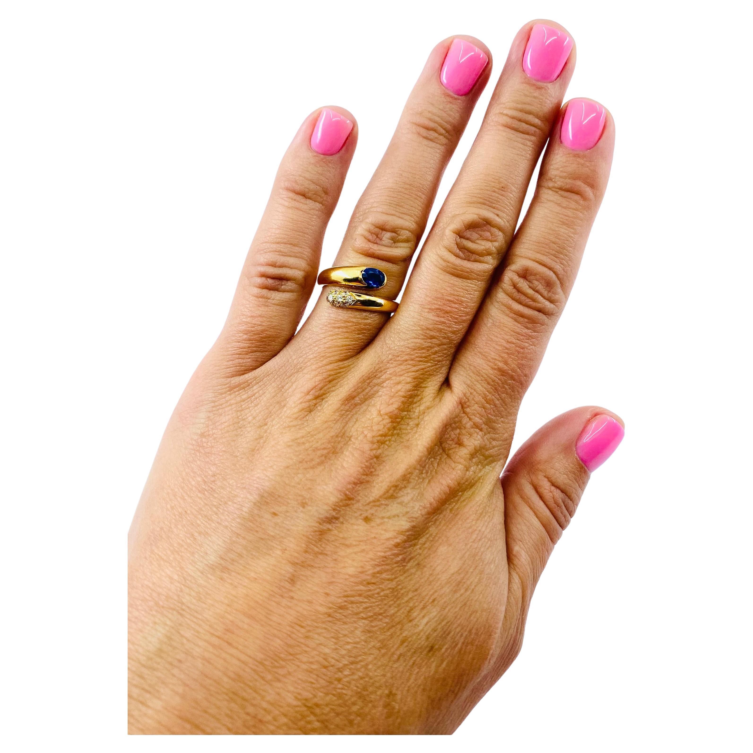 
A beautiful snake ring by Bulgari, made in 18k gold, featuring diamonds and sapphires.
It’s a wrap-around ring, which is a traditional look for a serpent jewelry. The tail of the snake is
encrusted with diamonds, and the head is the sapphire. It’s