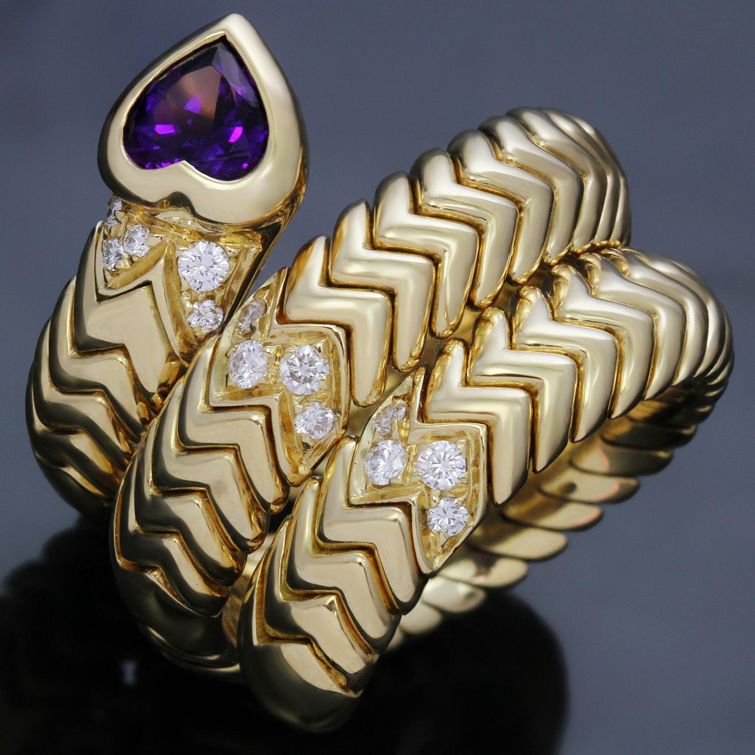 This stunning ring from Bulgari's iconic Spiga collection features a flexible 3-row geometric design crafted in 18k yellow gold and set with a heart-shaped amethyst and brilliant-cut round diamonds of an estimated 0.20 carats. Made in Italy circa