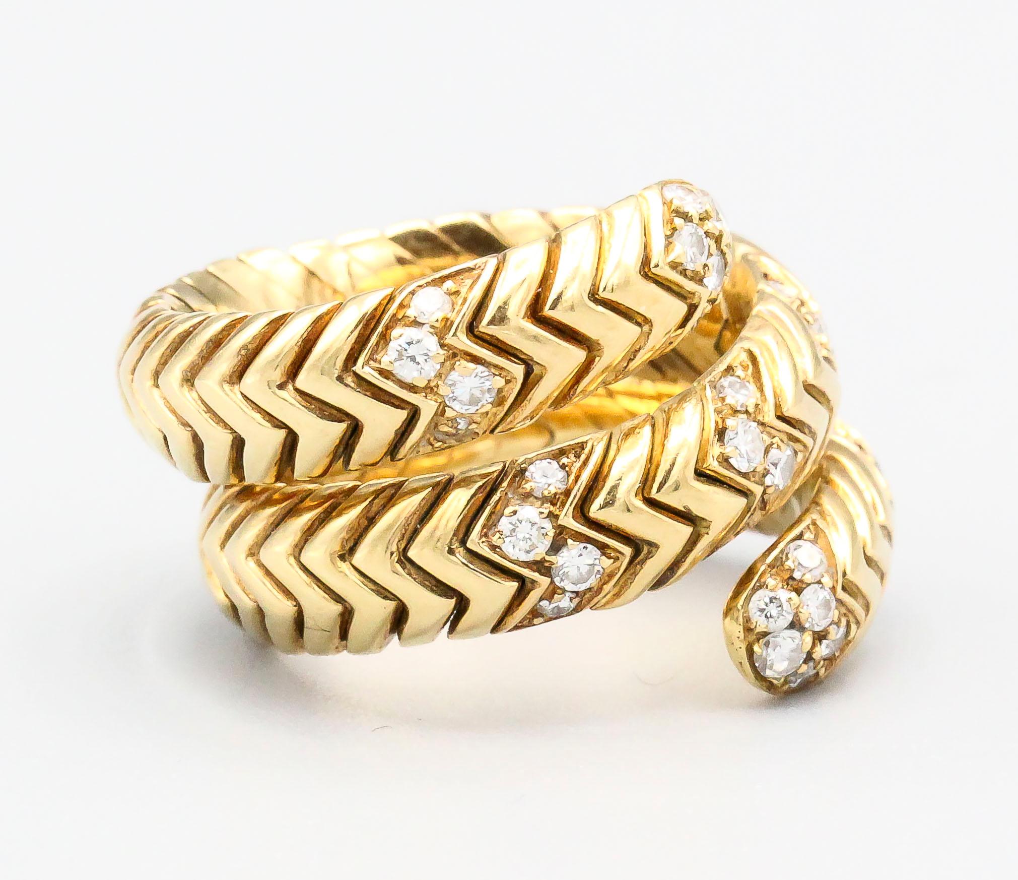 Fine diamond and 18K yellow gold flexible snake ring , from the 