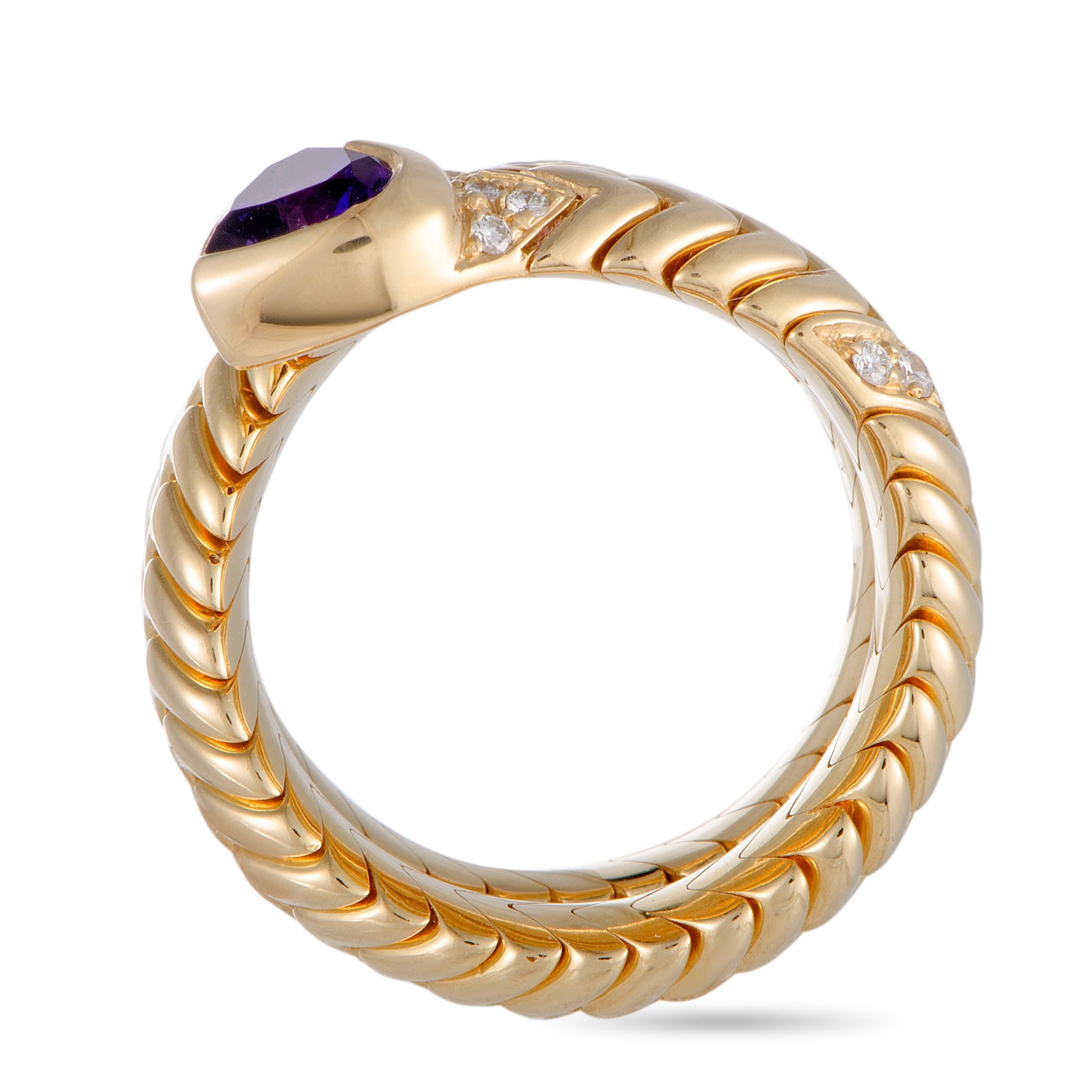 The Bvlgari “Spiga” ring is crafted from 18K yellow gold and set with an amethyst and a total of 0.30 carats of diamonds that feature grade F color and VS1 clarity. The ring weighs 22.9 grams, boasting band thickness of 11 mm and top height of 5 mm,
