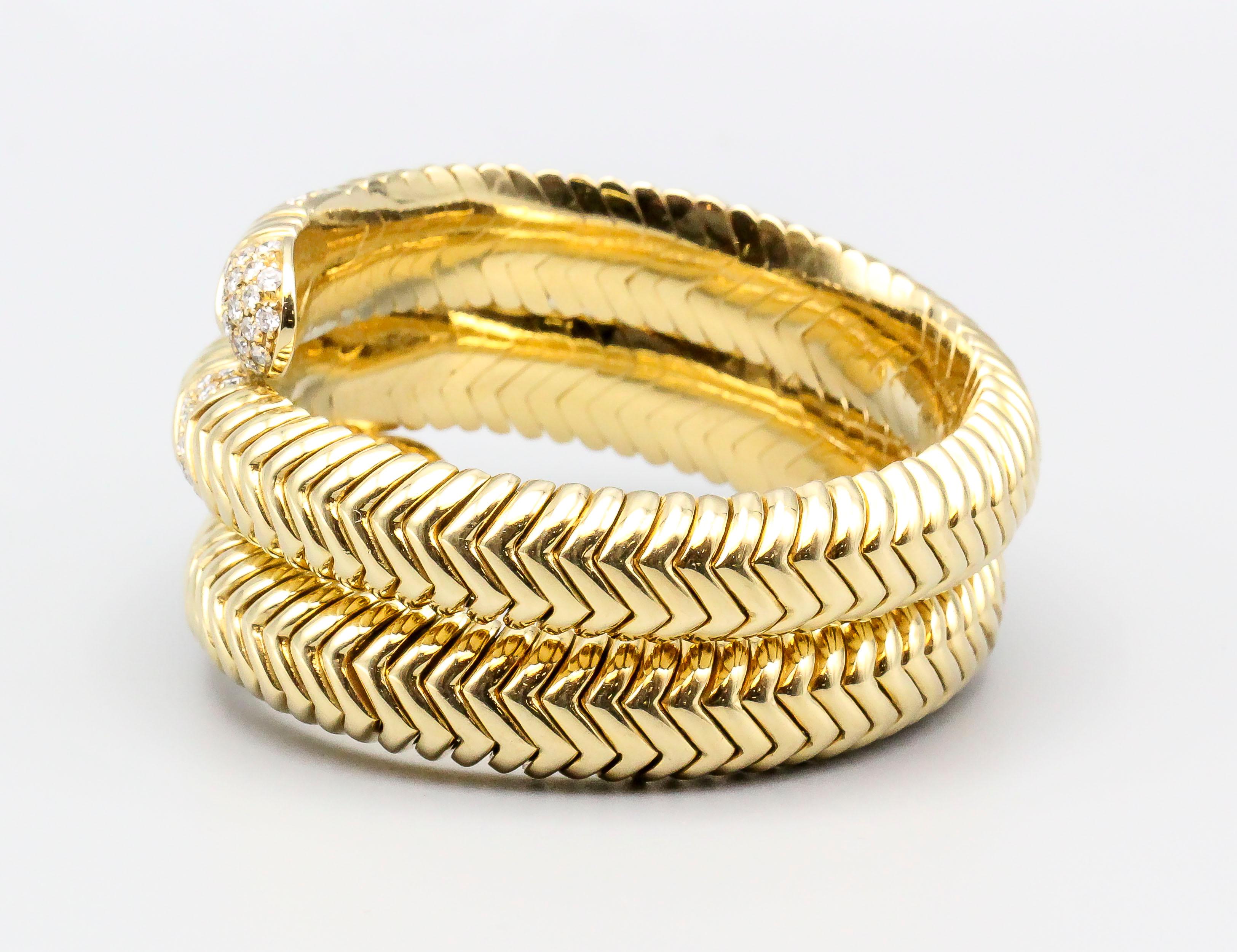 Very fine diamond and 18K yellow gold snake bracelet, from the 
