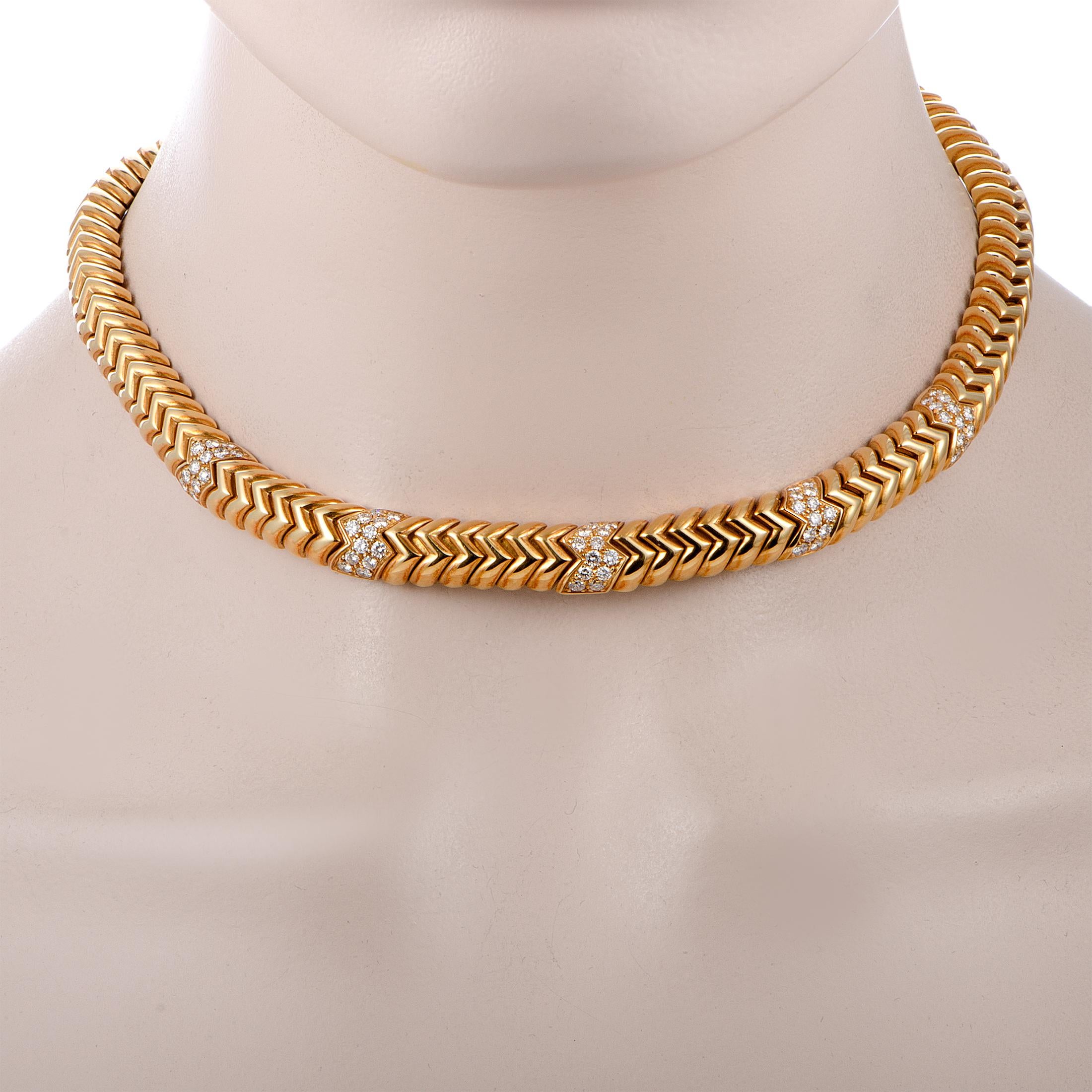 The Bvlgari “Spiga” necklace is made out of 18K rose gold and diamonds and weighs 132.1 grams, measuring 16.00” in length. The diamonds boast grade F color and VS clarity and amount to approximately 2.10 carats.

This jewelry piece is offered in