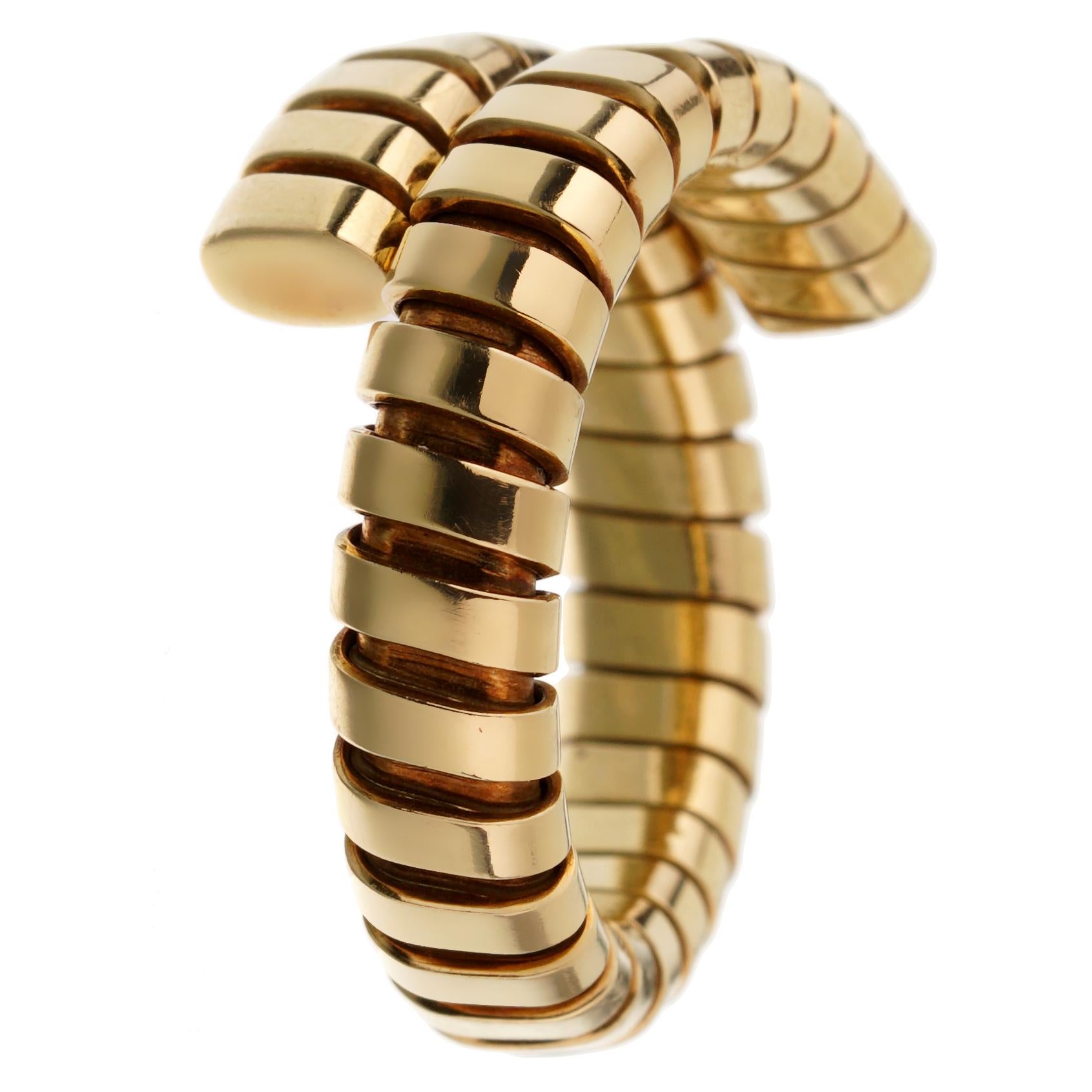 An iconic Bulgari spiga yellow gold flexible ring crafted in 18k yellow gold, the ring measures a size 7 and can be resized.