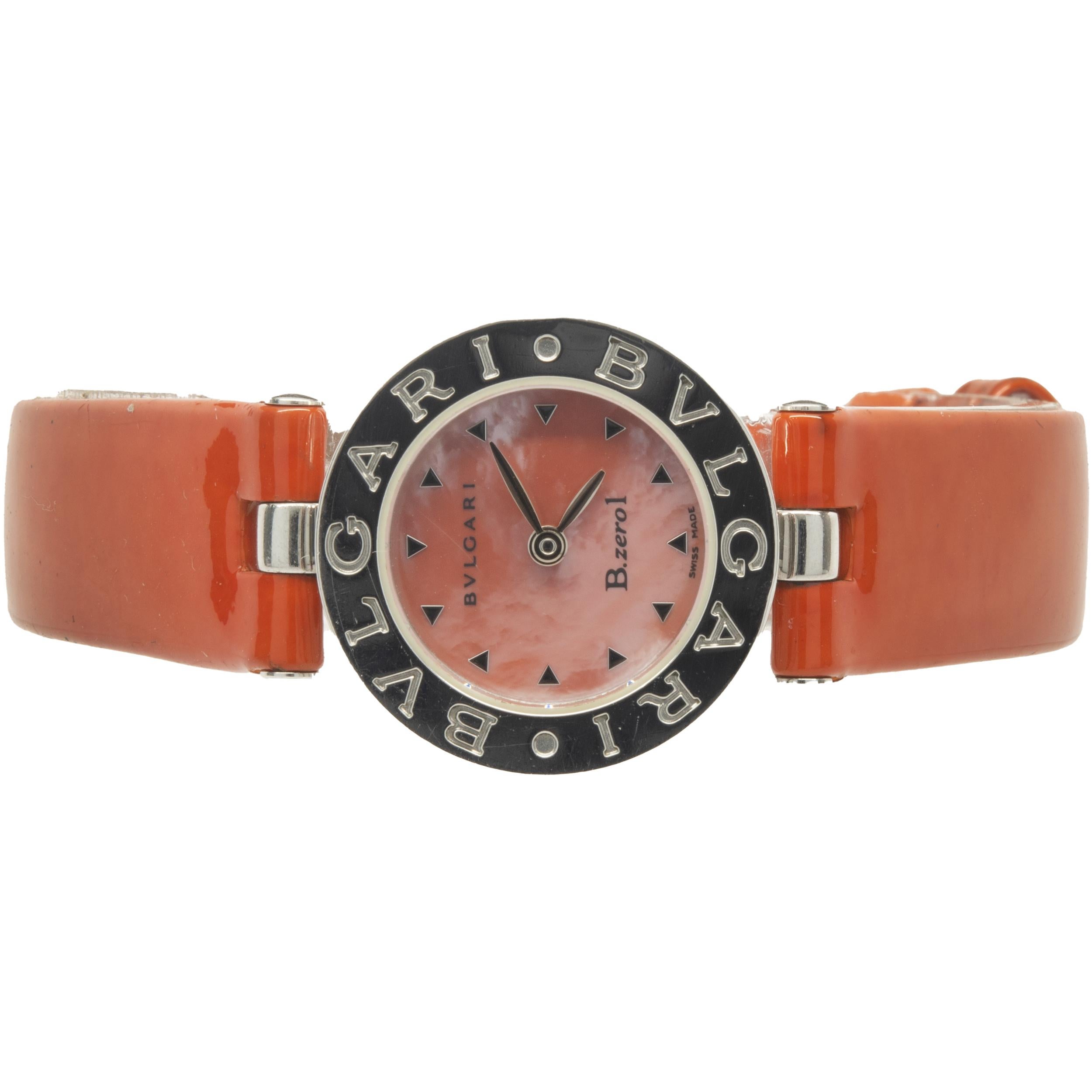 Movement: quartz
Function: hours, minutes
Case: 22mm round case, smooth Bulgari bezel, sapphire crystal
Band: Bulgari orange leather strap, integrated clasp
Dial: orange stick dial
Serial #: D83XXX
Reference #: BZ22s

No box or papers