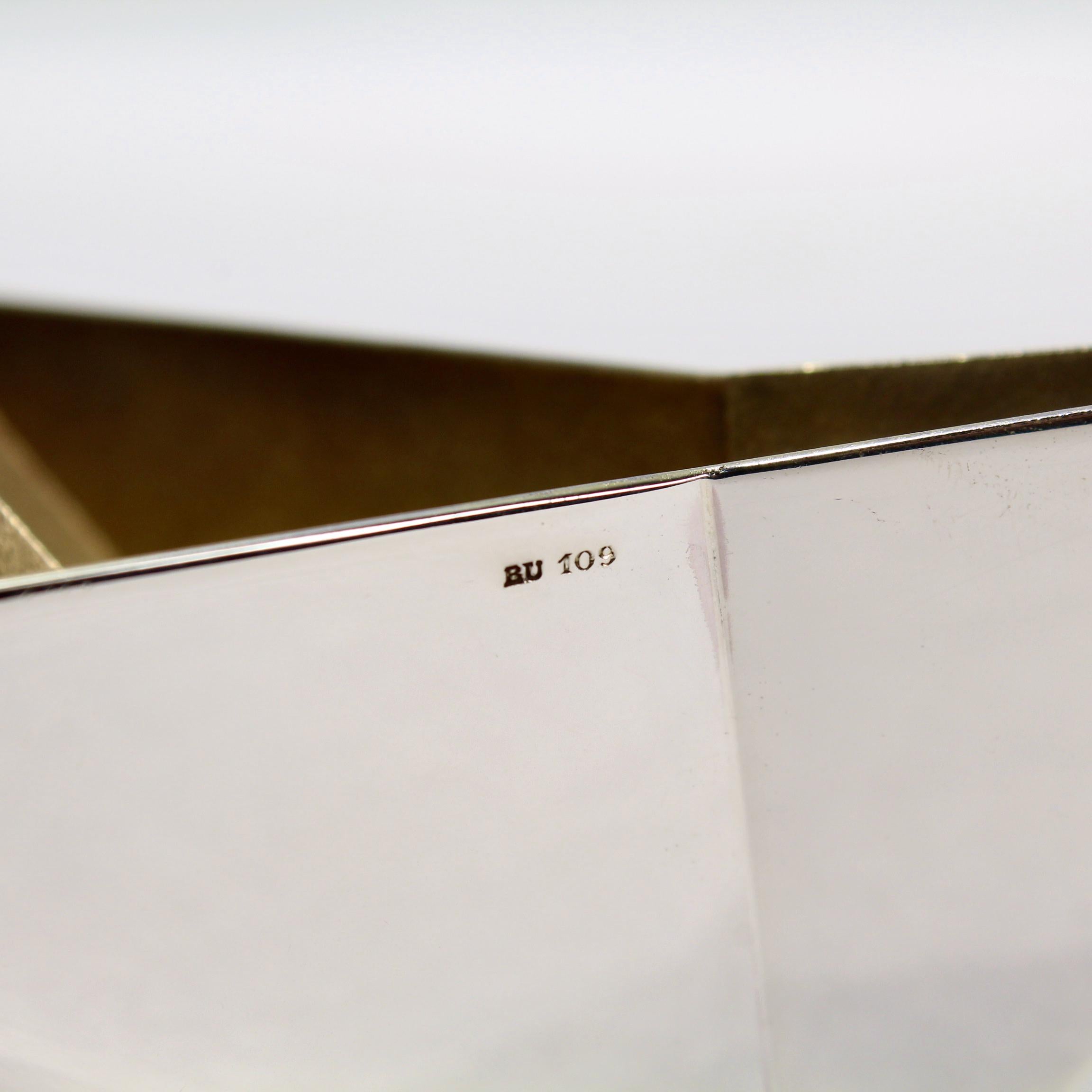 A very fine Bulgari sterling silver paperweight.

In the form of an origami folded paper boat.

With a smooth exterior and gilded, stippled interior.

An example of this rare form was included in the 2013 San Francisco Museum of Art's retrospective