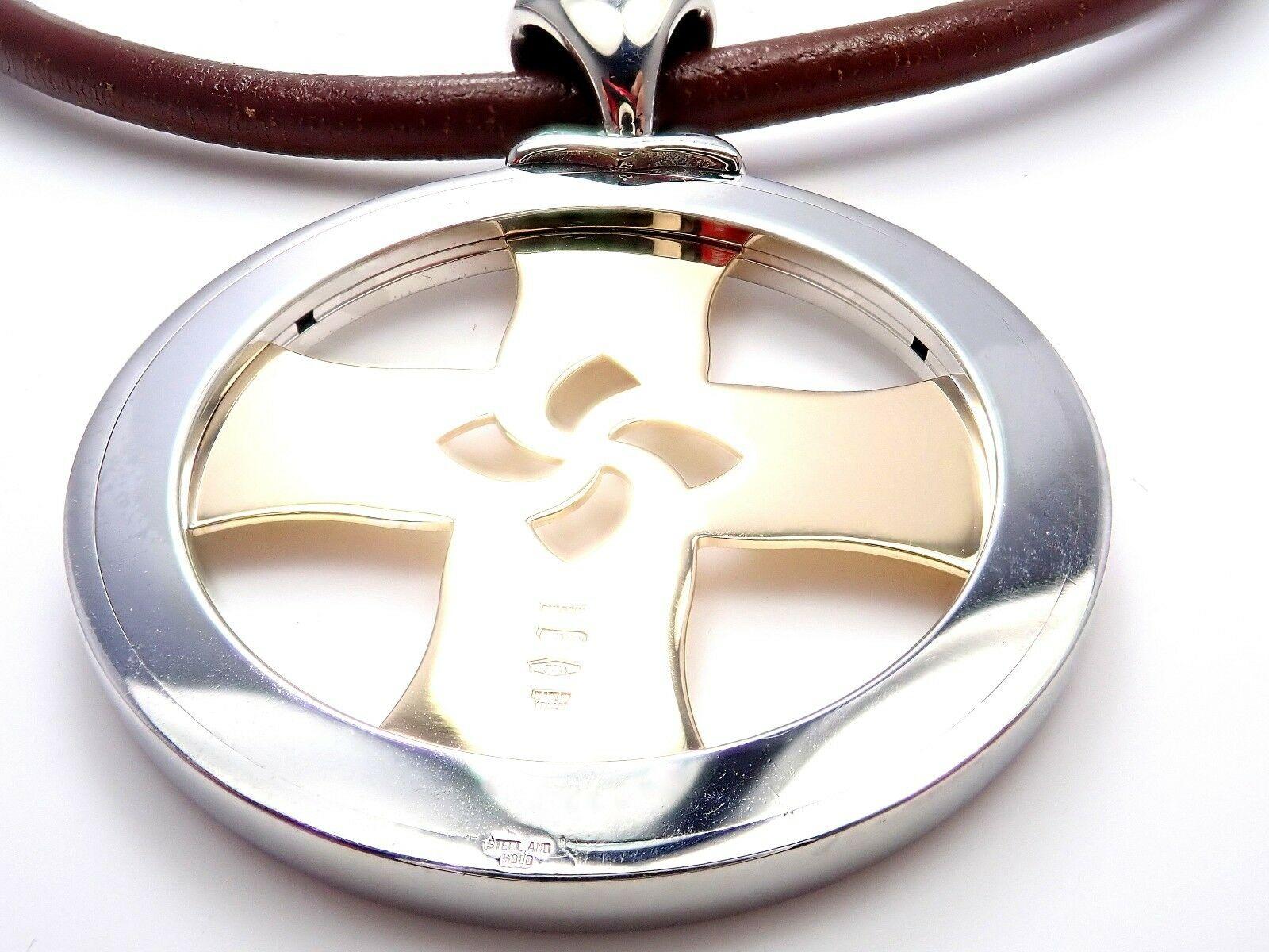 18k yellow gold and stainless steel Tondo Cross pendant necklace by Bulgari.
Details:
Leather Length: 17