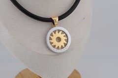 Bulgari Tondo Sun Pendant in 18K Gold & Steel with Leather Necklace