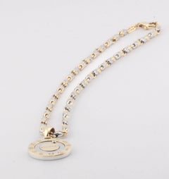 BULGARI Tondo Zodiac Diamond 18k Gold Steel Pendant Necklace