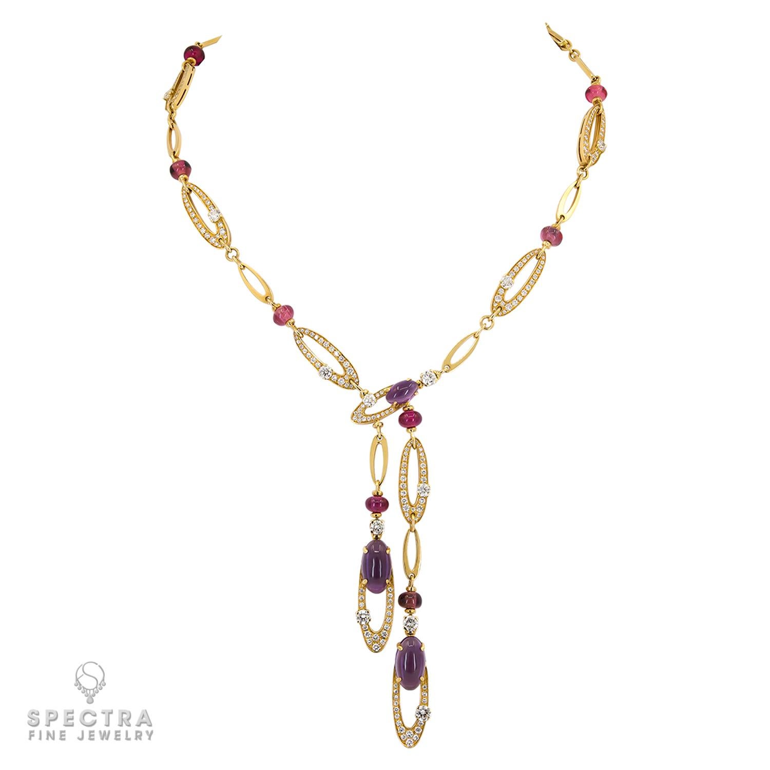 Stunning Multi-colored Gems Diamond 'Elisa' Set by Bulgari, a true masterpiece of fine jewelry. This demi-parure includes a necklace and earrings, meticulously handcrafted and signed by the prestigious brand BVLGARI. Crafted in 18k yellow gold, this