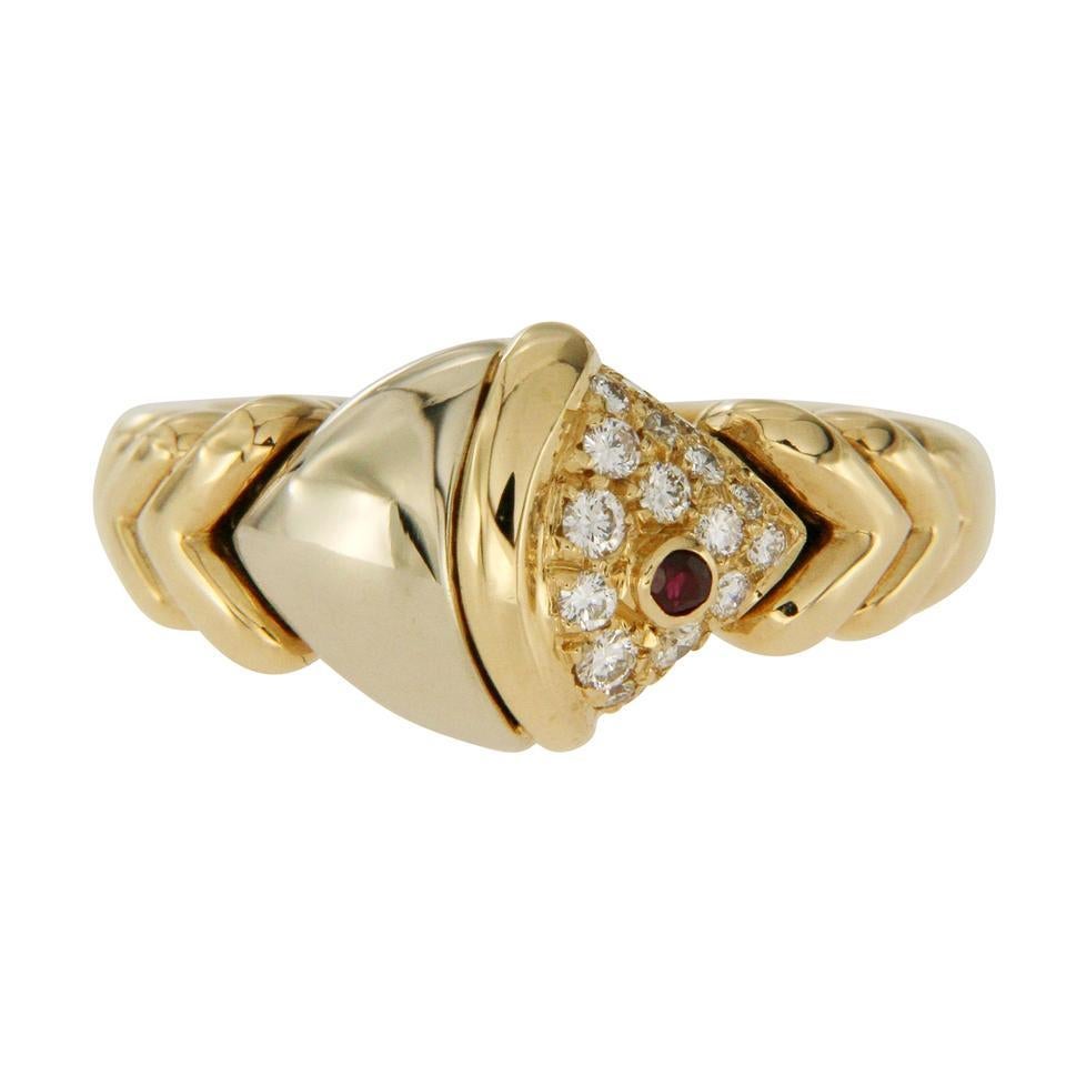 Type: Ring
Top: 9.3 mm
Band Width: 2 mm
Metal: White and Yellow Gold
Metal Purity: 18K
Size:5.75
Hallmarks: BVLGARI 750
Total Weight: 7.9 Grams
Stone Type: 0.18 CT F VV1 Diamonds and Ruby
Condition: Pre Owned
Stock Number: U118