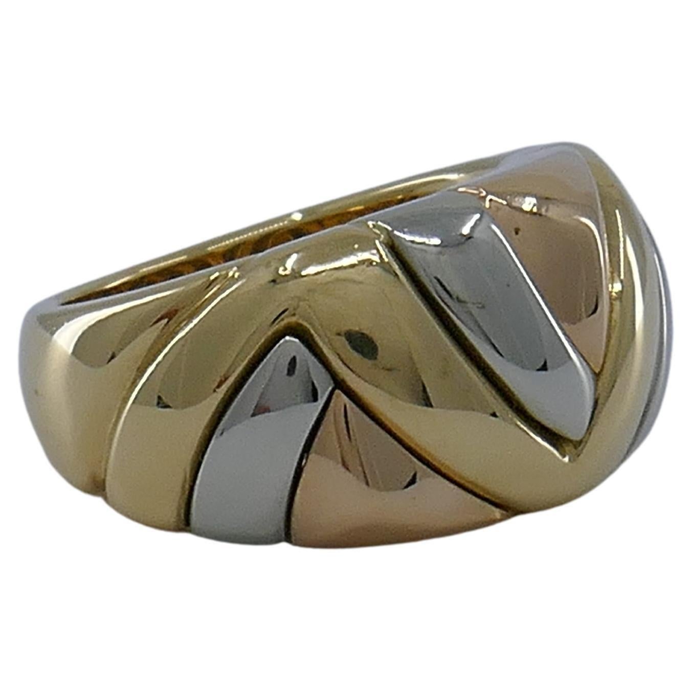 Designed as a dome ring, with the yellow, white and rose gold lines interlacing with each other.
High-polished finish creates the silky smooth curves. The ring appears to be soft and fluid. The dome shape makes it look futuristic.
It’s a great