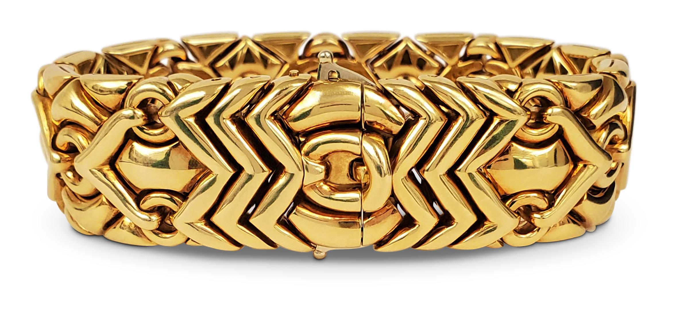 Authentic Bulgari bracelet from the Trika collection crafted in 18 karat yellow gold.  Featuring links of smooth polished gold arranged in an intricate geometric pattern.  The gold is in excellent condition with original vintage patina.   Bracelet