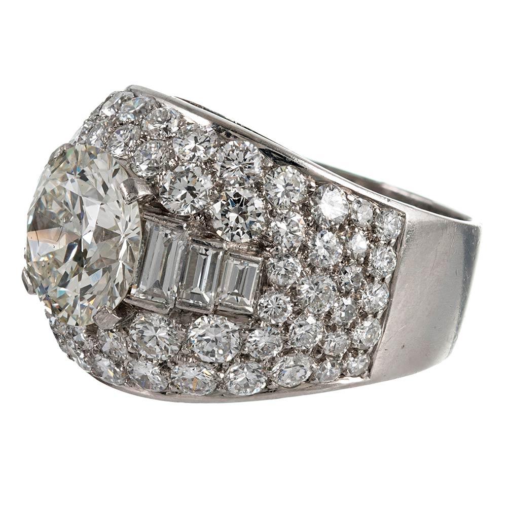 Bulgari’s iconic Trombino collection was first introduced in the 1930s. The sophisticated and wearable style has proven one of its most long-running designs. This ring is made of platinum and set in the center with a 3 carat round diamond that