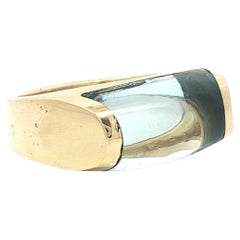 Bague Bulgari Tronchetto en or jaune 18k avec topaze bleue taillée sur mesure