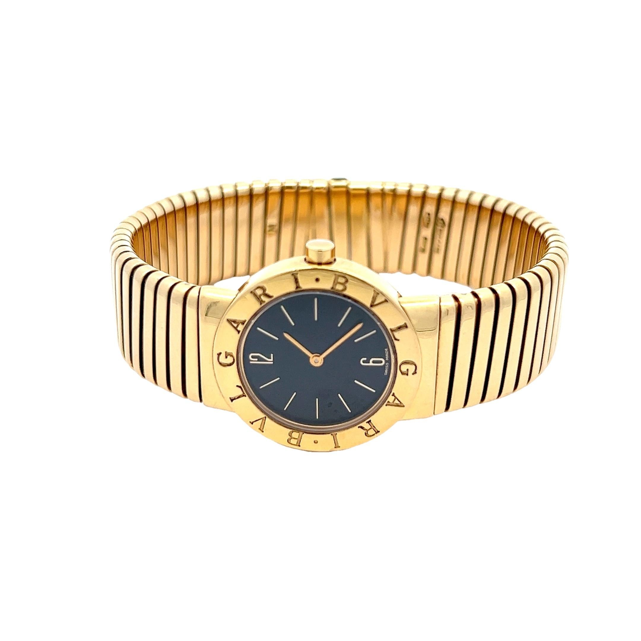 Sculptural, refined, and unmistakably iconic, this Bulgari Tubogas watch is a masterpiece of contemporary Italian design. Meticulously crafted in rich 18K yellow gold, the timepiece showcases Bulgari’s famed Tubogas construction — a flexible,