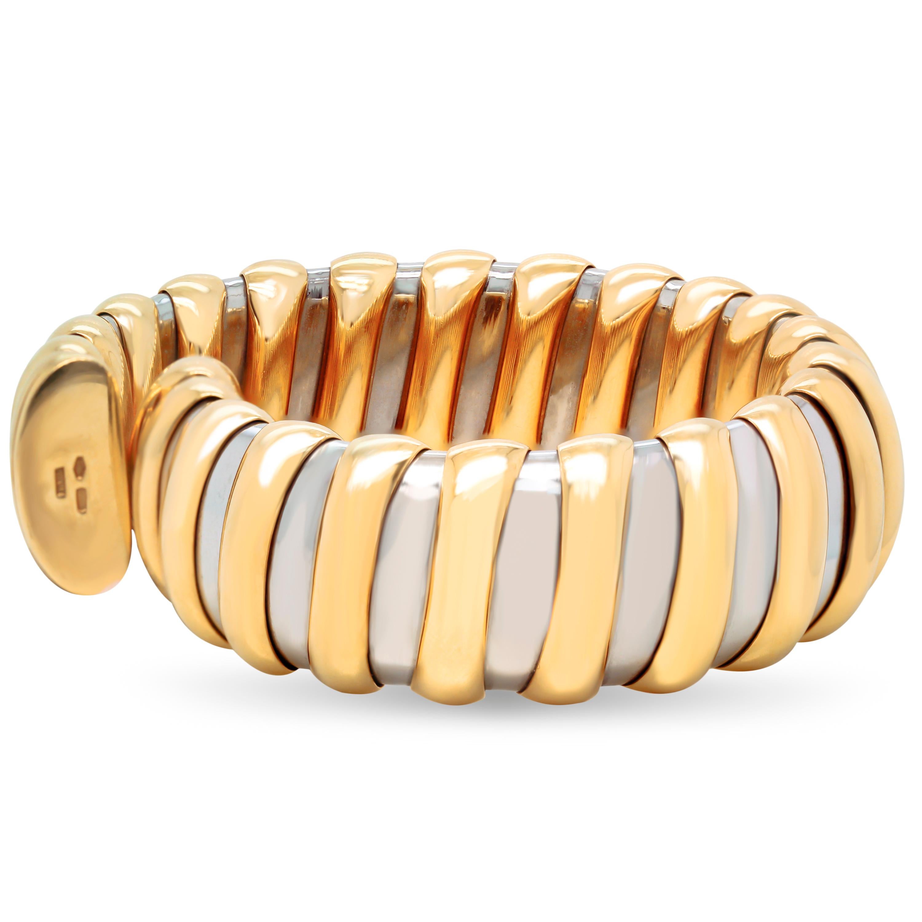 Bulgari Tubogas 18K Yellow Gold Stainless Steel Flexible Bangle Bracelet

This unique bracelet by Bulgari is done entirely in Stainless Steel and 18K Gold. The bangle is quite flexible and stretches open to wear.

Size 7.5. (7.5 inch length). 0.75