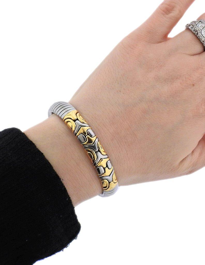 18k gold and stainless steel Tubogas Alveare bracelet by Bvlgari. Bracelet will fit approx. 6.75