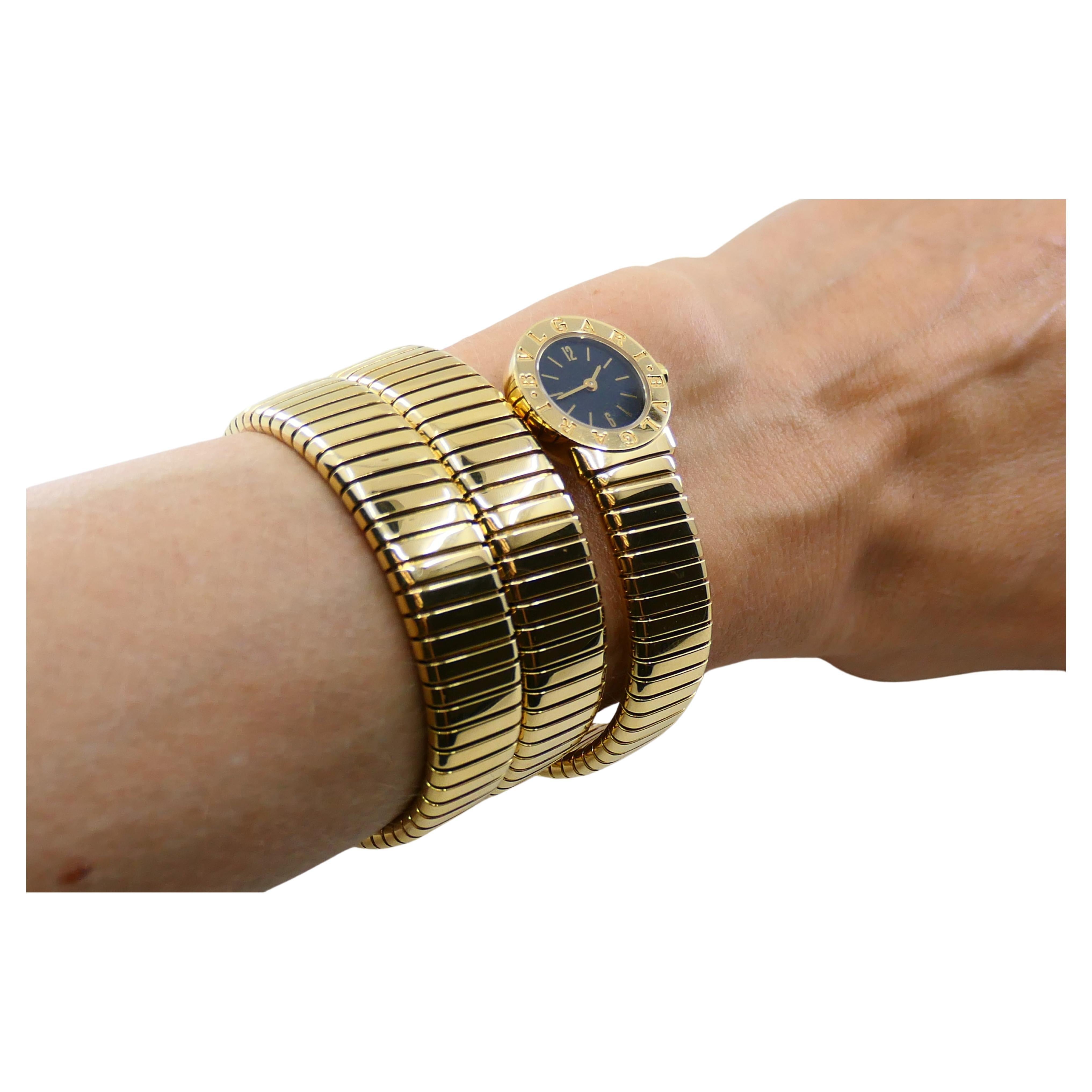 A Bulgari Tubogas 18k gold triple wrap-around watch.
An iconic piece that lately became a must-have among fashionistas all over the world. 

The case with a snap-on back is stamped with the maker's mark, a model, a serial number and a country of