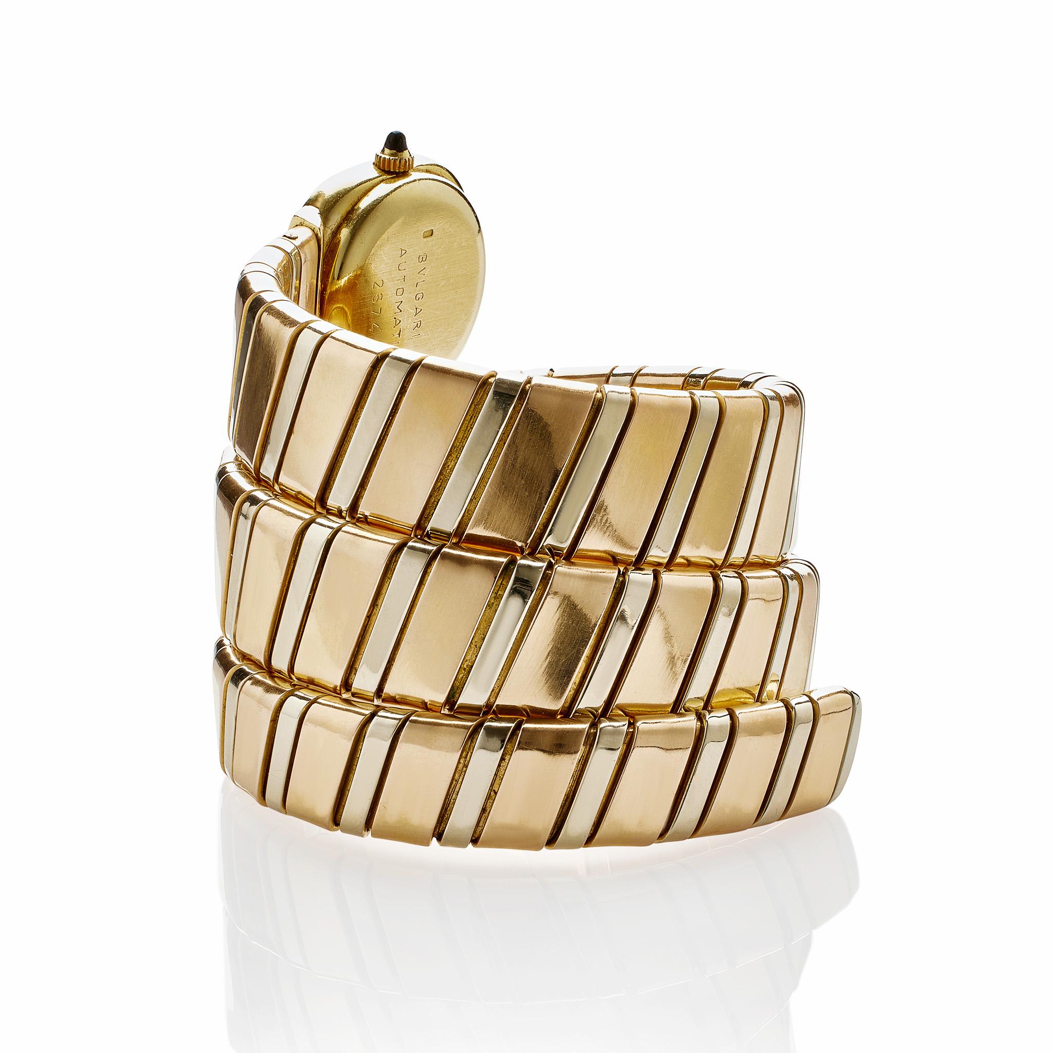 Montre-bracelet automatique Tubogas Serpenti en or tricolore 18 carats de Bulgari Unisexe en vente