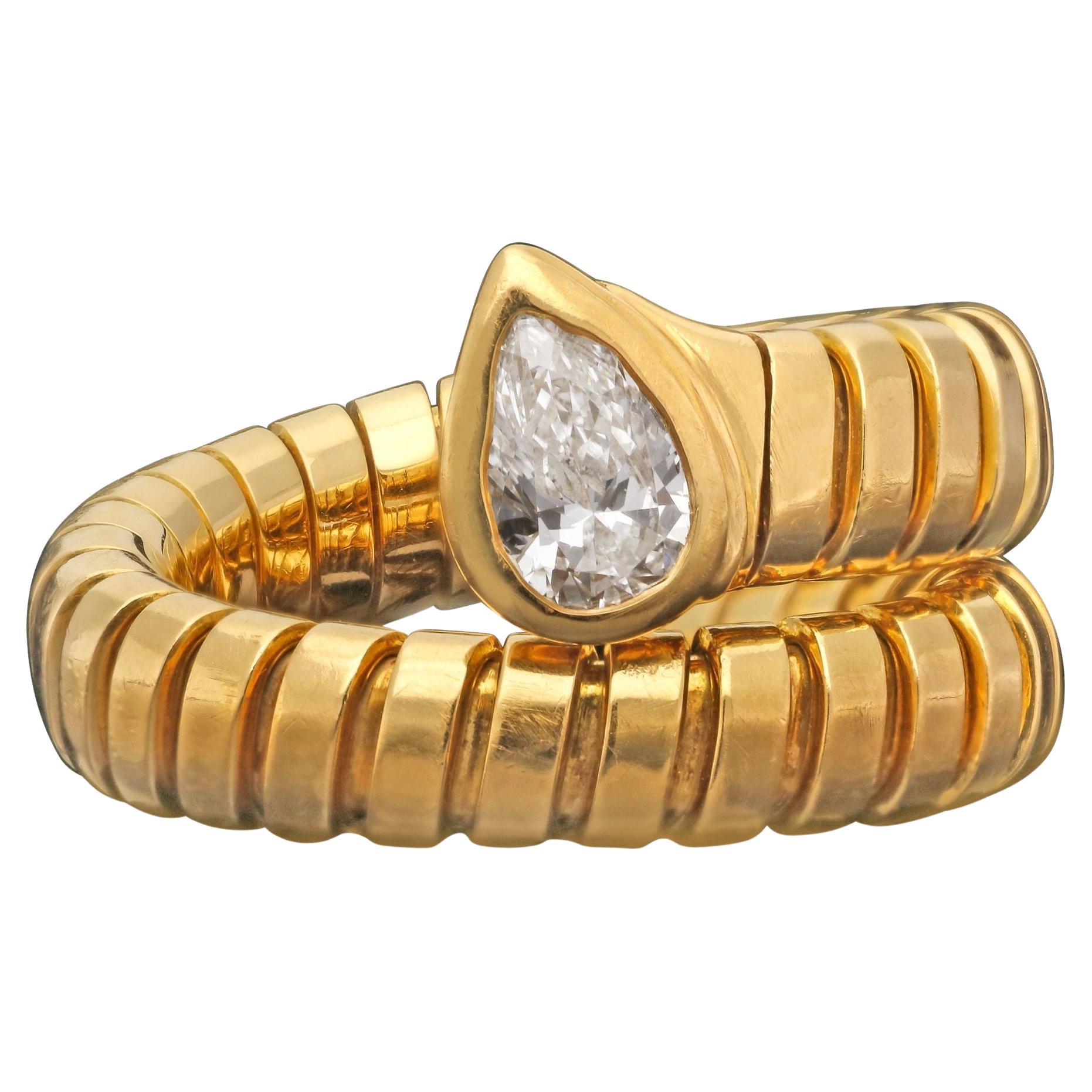 Bulgari Tubogas Serpenti Ring in 18 Ct Yellow Gold with Pear Shaped Diamond Head For Sale
