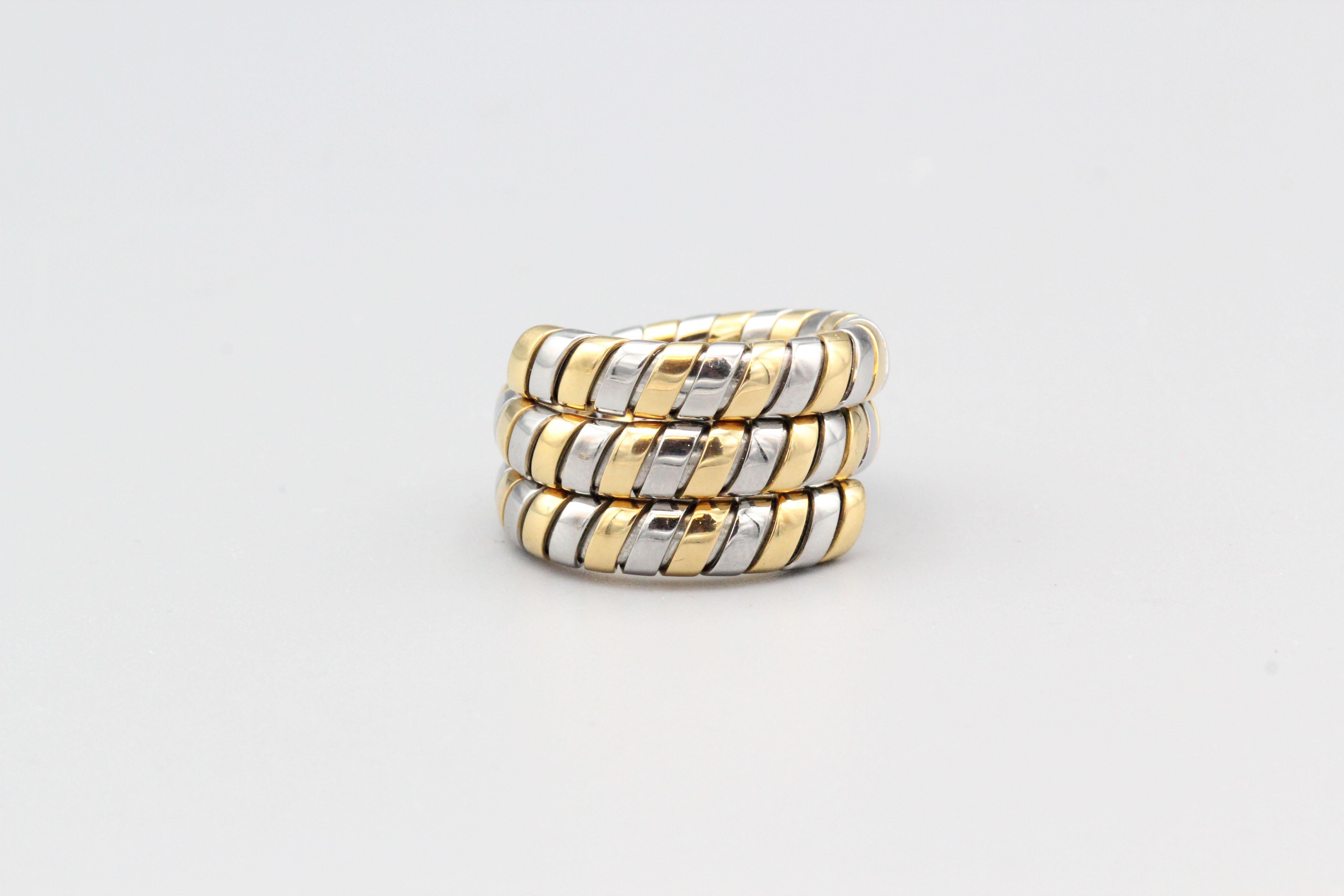 Fine 18K yellow and steel snake ring from the 