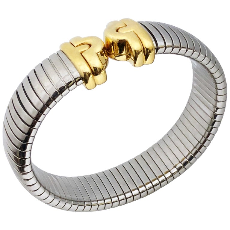 Bulgari Tubogas Steel and Yellow Gold Cuff Bracelet at 1stDibs | bvlgari tubogas  bracelet, bulgari cuff bracelet, bvlgari cuff