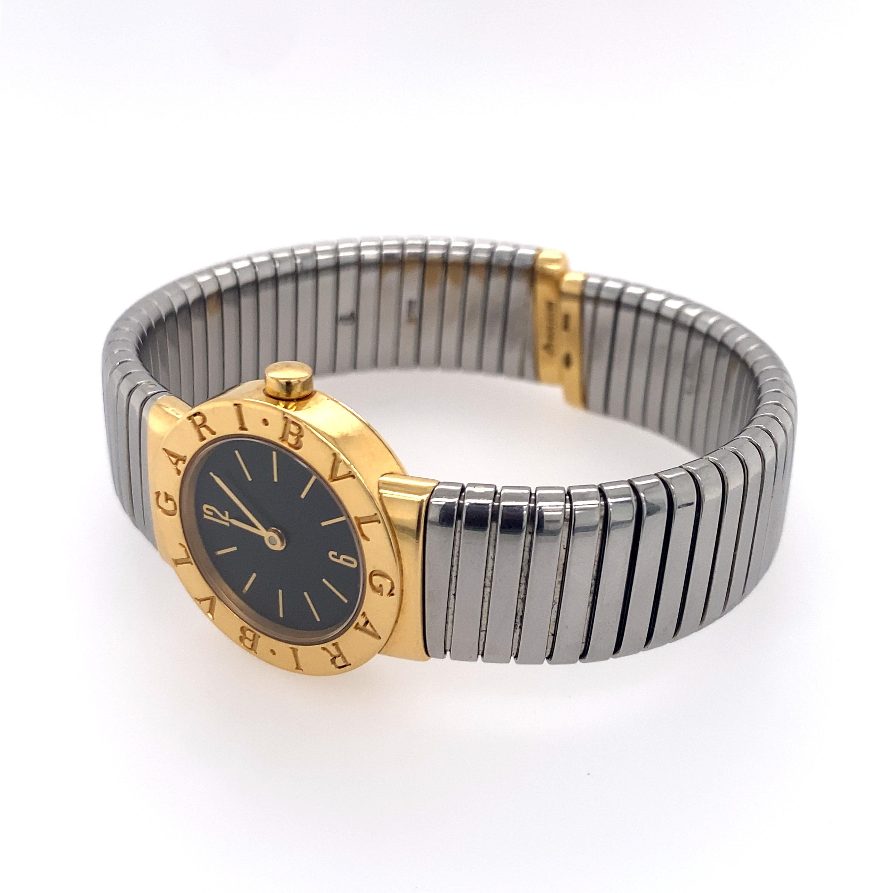 Contemporary Bulgari Tubogas Watch in 18K Yellow Gold and Steel For Sale