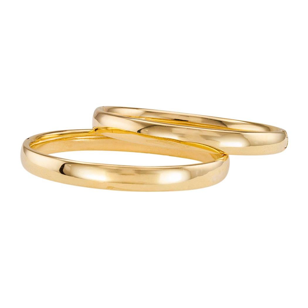 Bulgari twin yellow gold hinged bangle bracelets circa 1970.  Clear and concise information you want to know is listed below.  Contact us right away if you have additional questions.  We are here to connect you with beautiful and affordable jewelry.