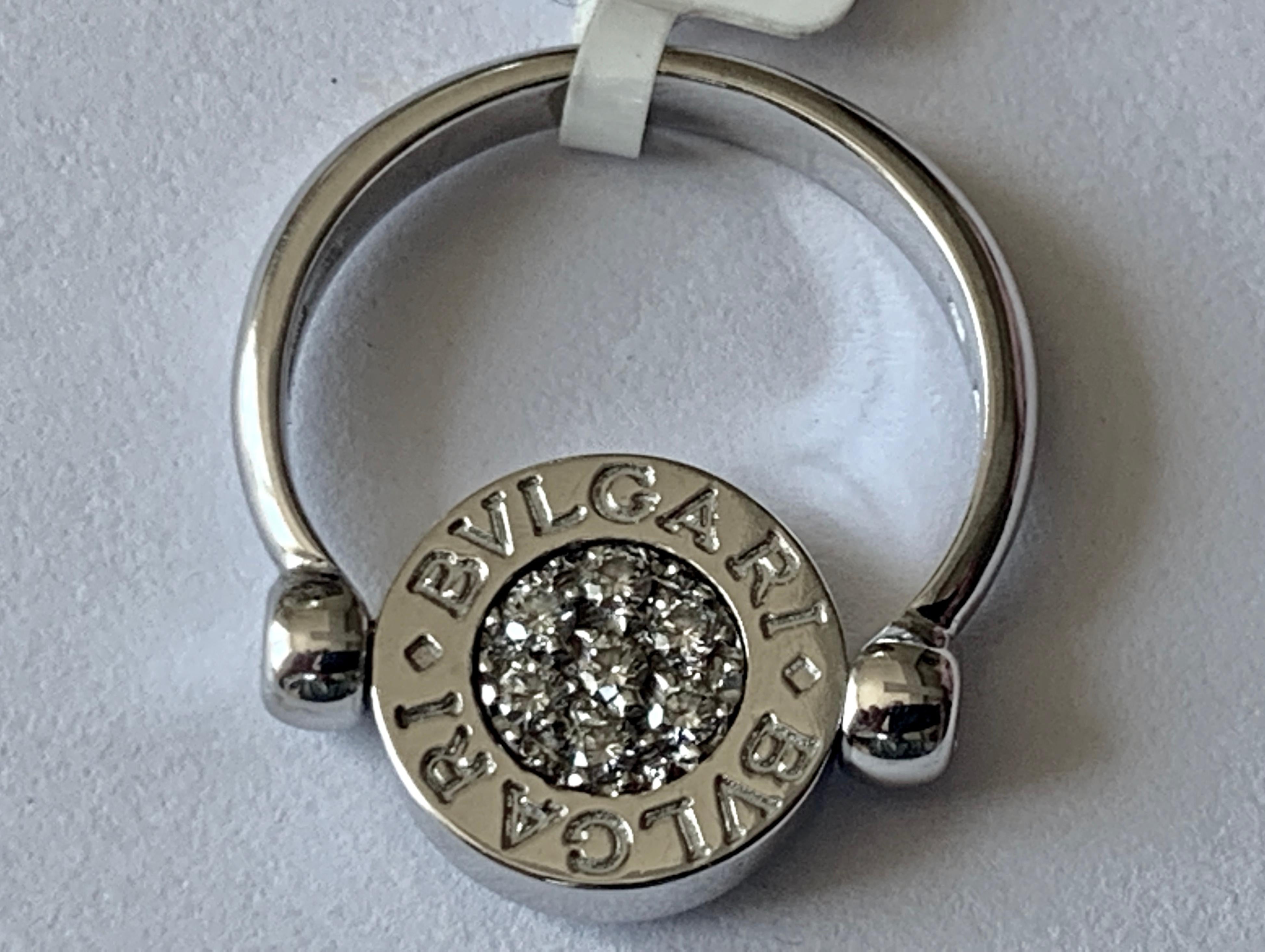 Modern Bulgari Twisted Ring in 18 Karat White Gold, Diamonds and Onyx For Sale