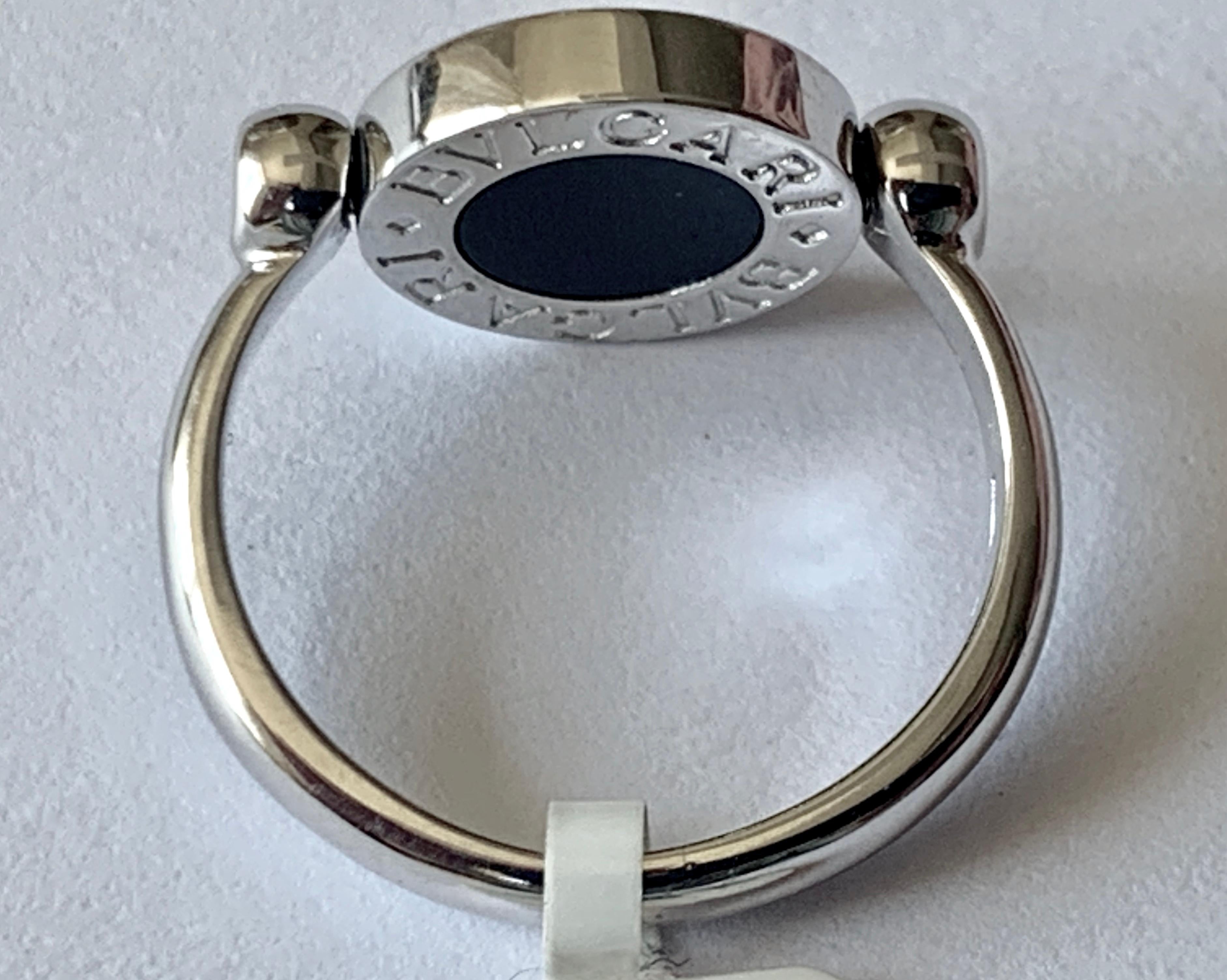 Bulgari Twisted Ring in 18 Karat White Gold, Diamonds and Onyx In Good Condition For Sale In Zurich, Zollstrasse