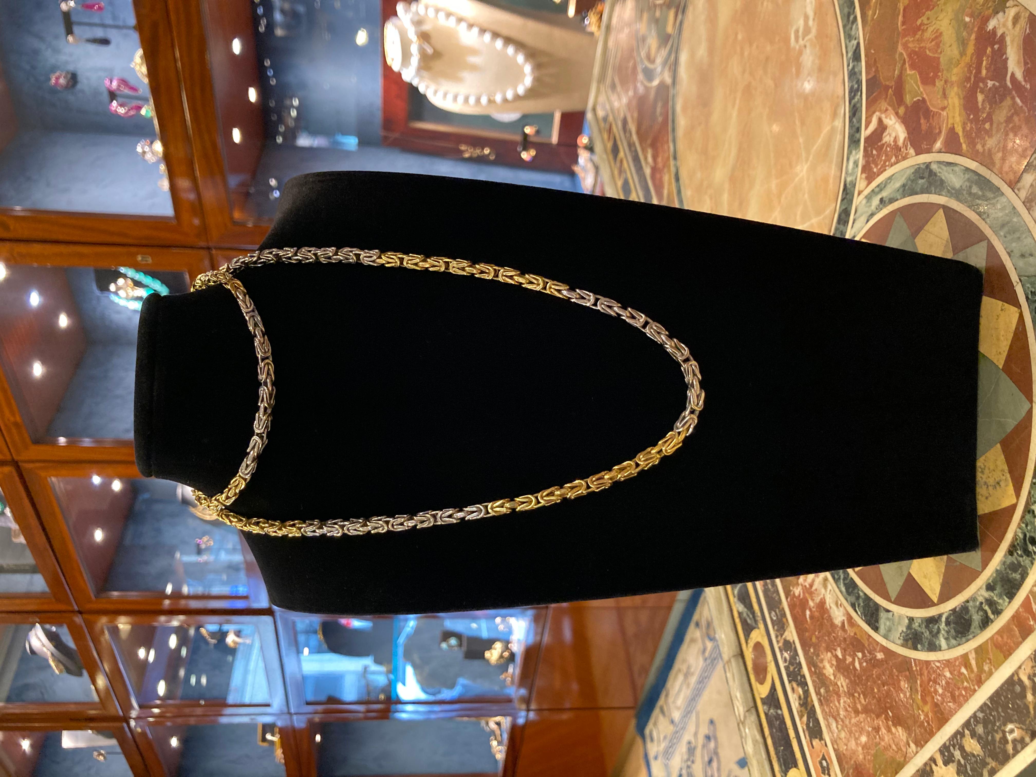 A chic two-color 18 karat gold long sautoir chain necklace by Bulgari. Made in Italy, circa 1970. Weighs 87.9 grams and measures 35 inches (88.9 cm) long. 