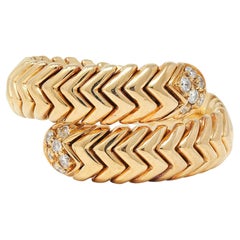 Bulgari Anello Vintage By con diamante in oro giallo 18 carati Spiga Tubogas
