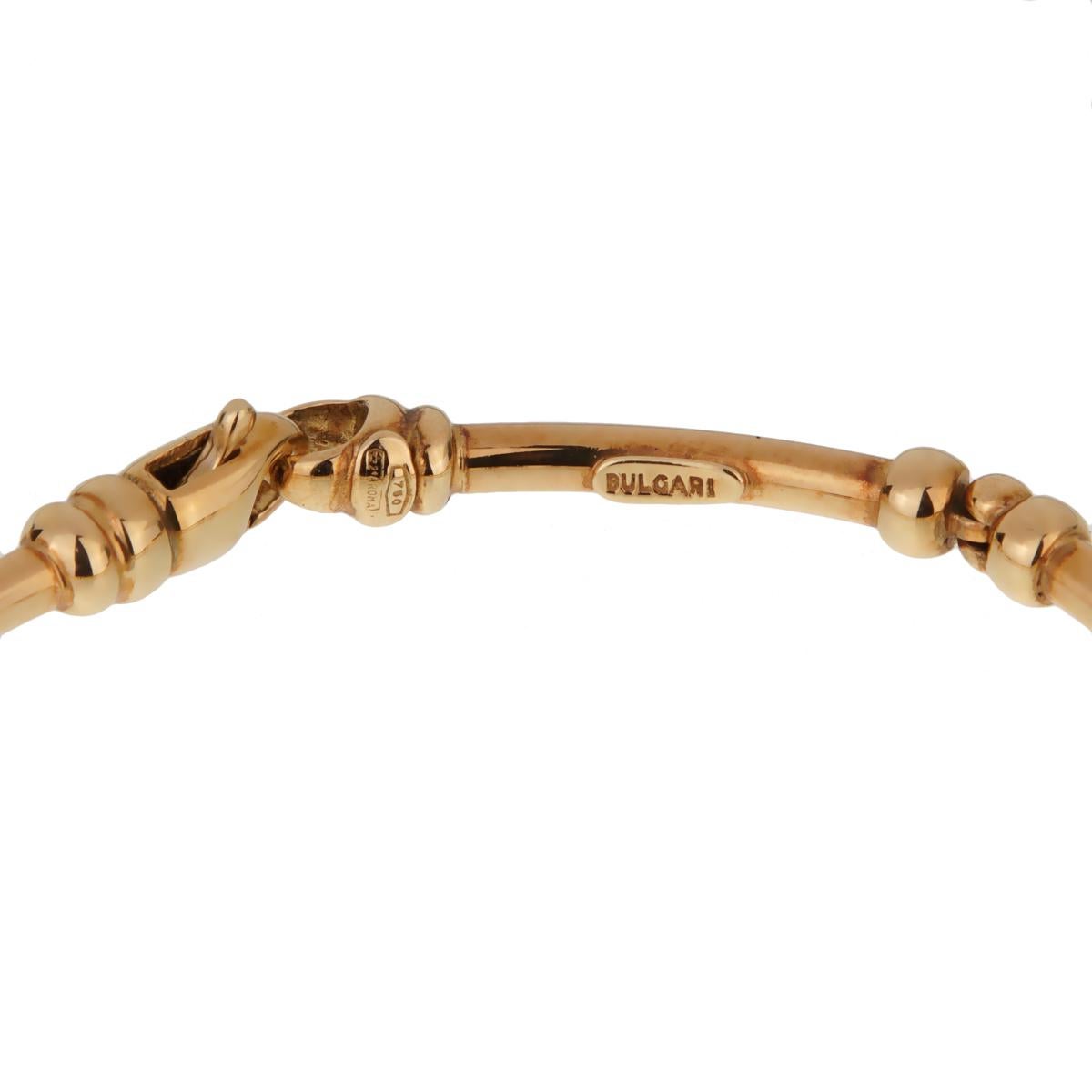 A chic vintage Bulgari bracelet showcasing a tubular design in shimmering 18k yellow gold. Circa 1990s.

Length 7