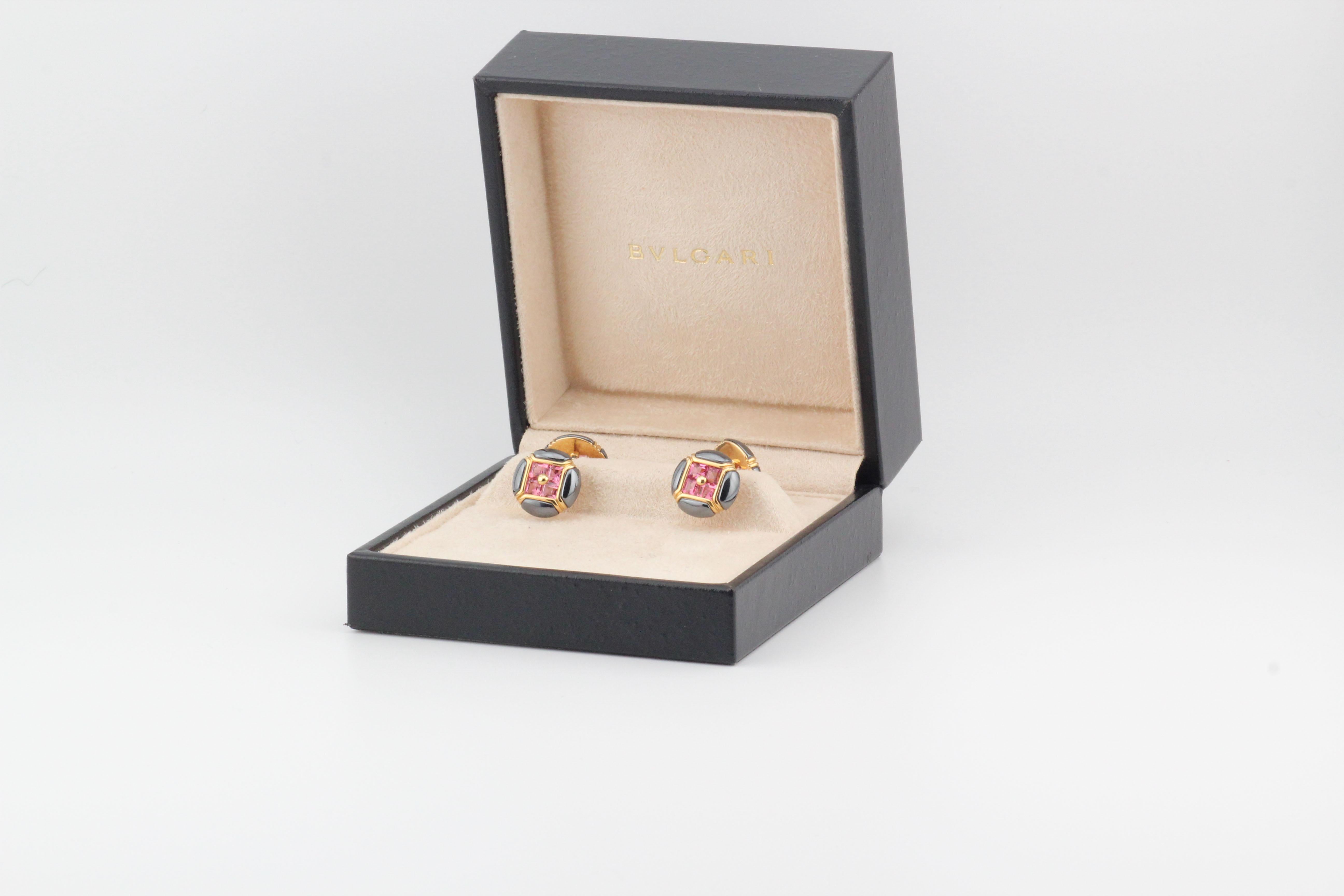 Immerse yourself in the timeless sophistication of the Bulgari Vintage Pink Tourmaline Hematite Inlay 18k Yellow Gold Cufflinks—a rare and exquisite accessory that seamlessly marries luxurious materials with impeccable craftsmanship. Crafted by