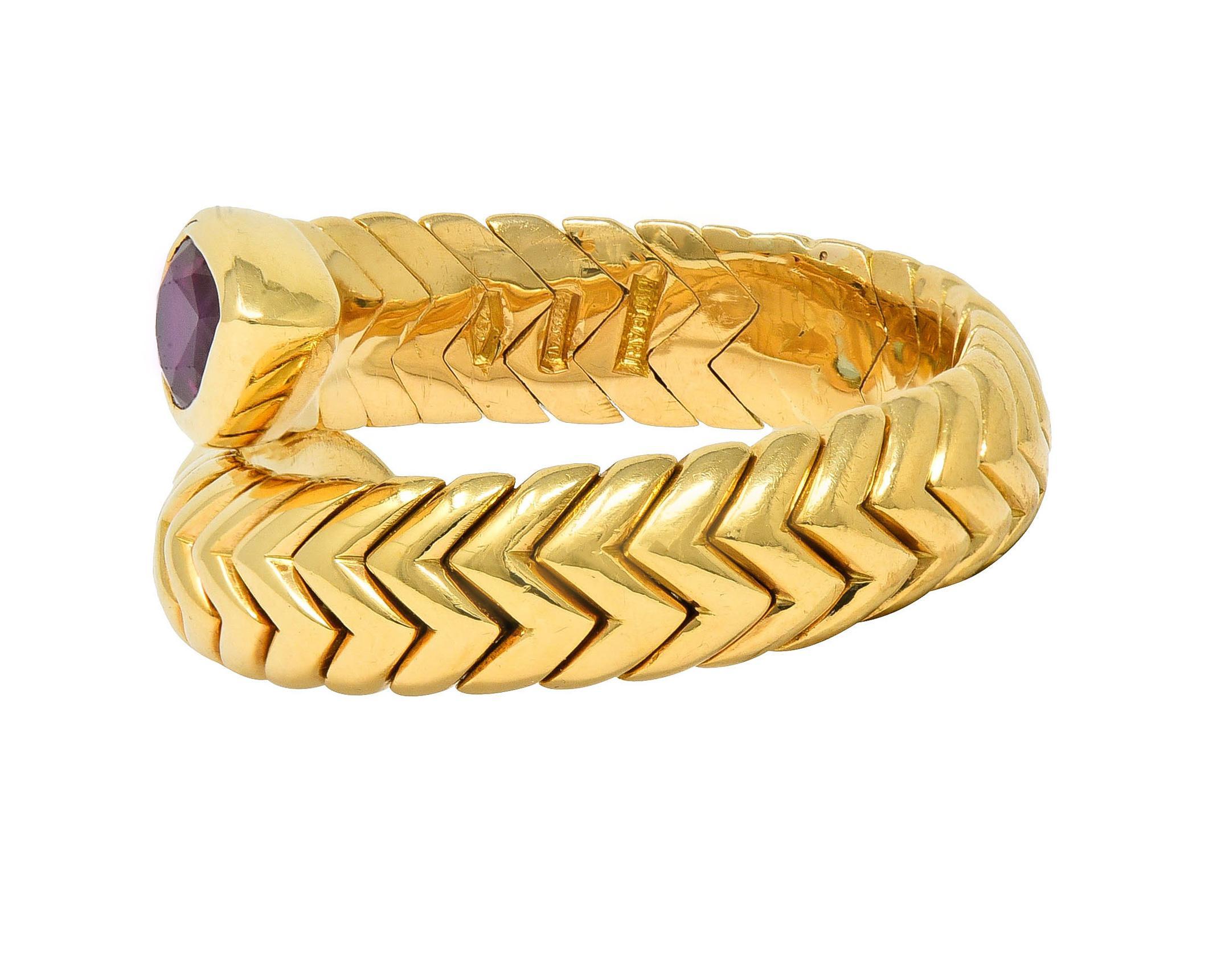 Women's or Men's Bulgari Vintage Ruby Topaz 18 Karat Yellow Gold Spiga Tubogas Bypass Ring For Sale