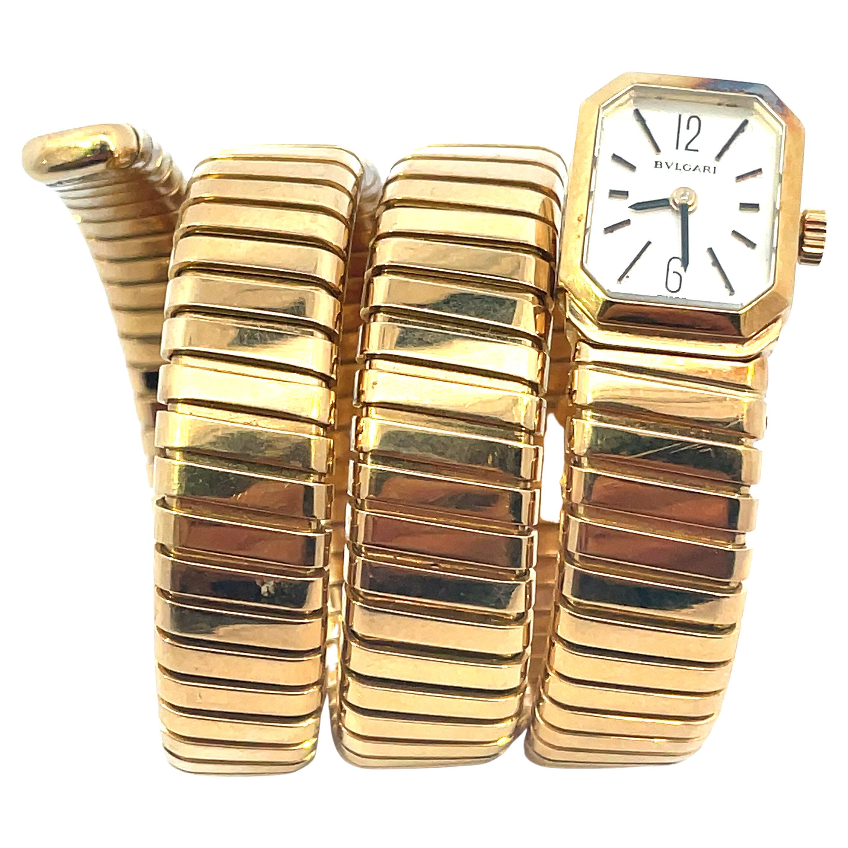 A rare vintage Bulgari Tubogas watch, made of 18k yellow gold, circa 1970s.

The gold watch features a rectangular case with a black matte dial. The dial equipped with the gold hands, gold Arabic numerals at 12 and 6and baton markers.

Bulgari