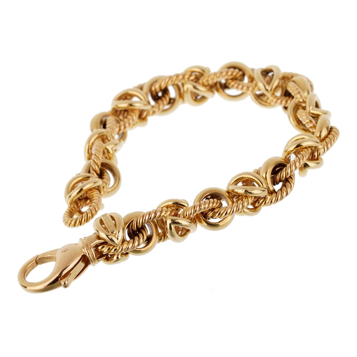 An exceptional vintage bracelet by Bulgari showcasing a chain link crafted in 18k yellow gold. The bracelet measures 7 3/4