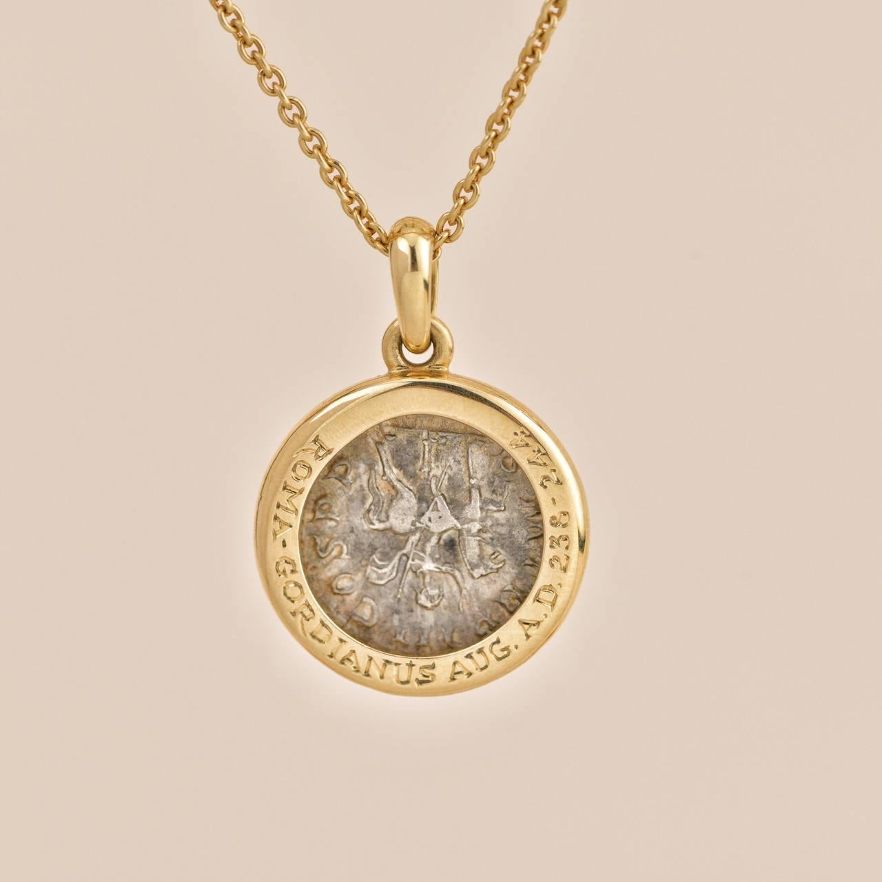 SKU: AT-1541
Brand Bulgari
Date Circa 1990's
Serial No. CXP***
__________________________________
Metal 18K Yellow Gold
Pendant Length	Approx. 41 cm
Pendant Weight	Approx. 17g
Pendant diameter	Approx. 23