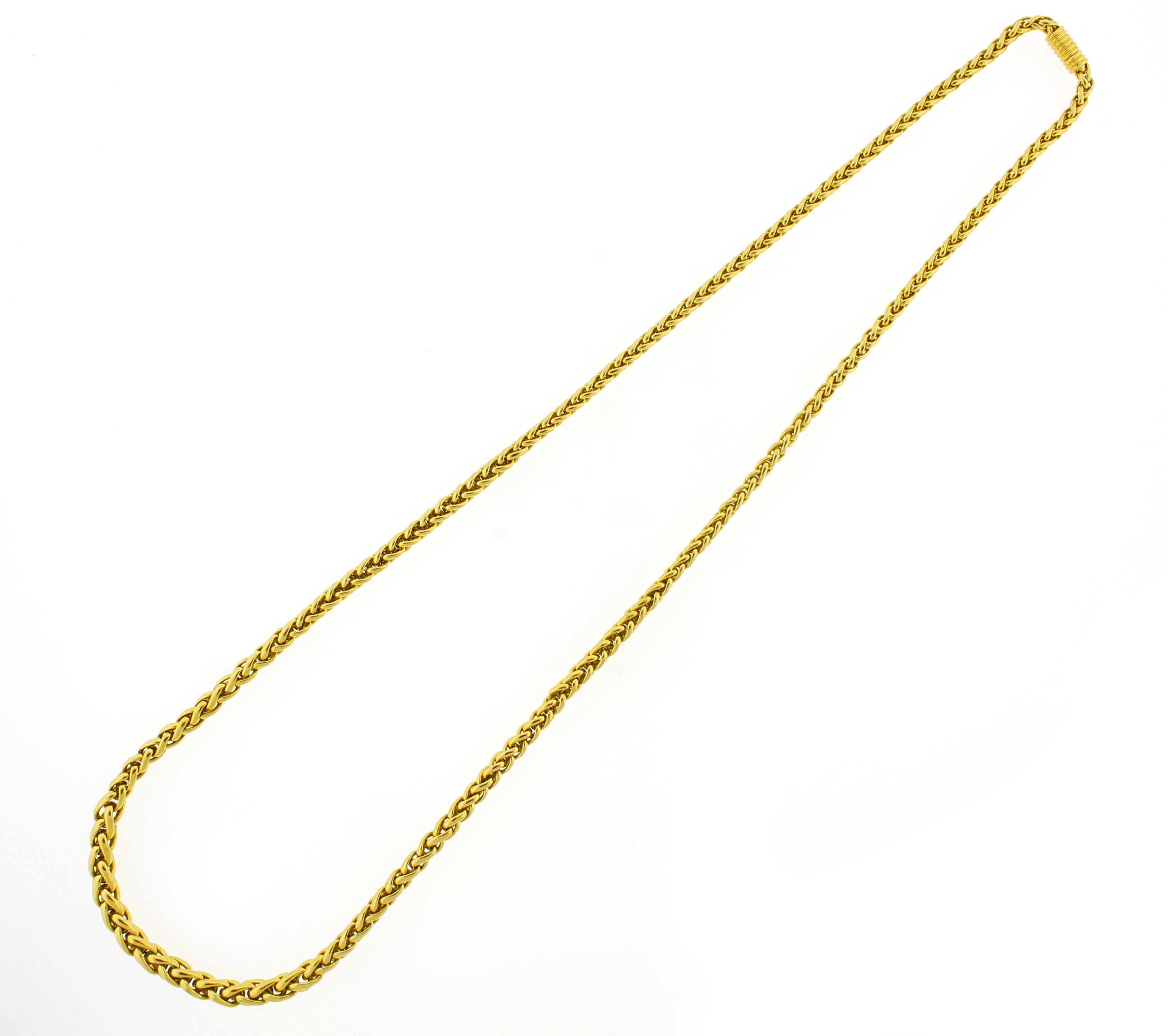 From Italian Jeweler Bulgari, a 27 inch graduated wheat link bracelet. The 18 karat yellow gold necklace graduates from 6mm to 4mm.  94 grams