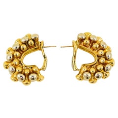 Bvlgari Bulgari Orecchini con osso in oro bianco e giallo
