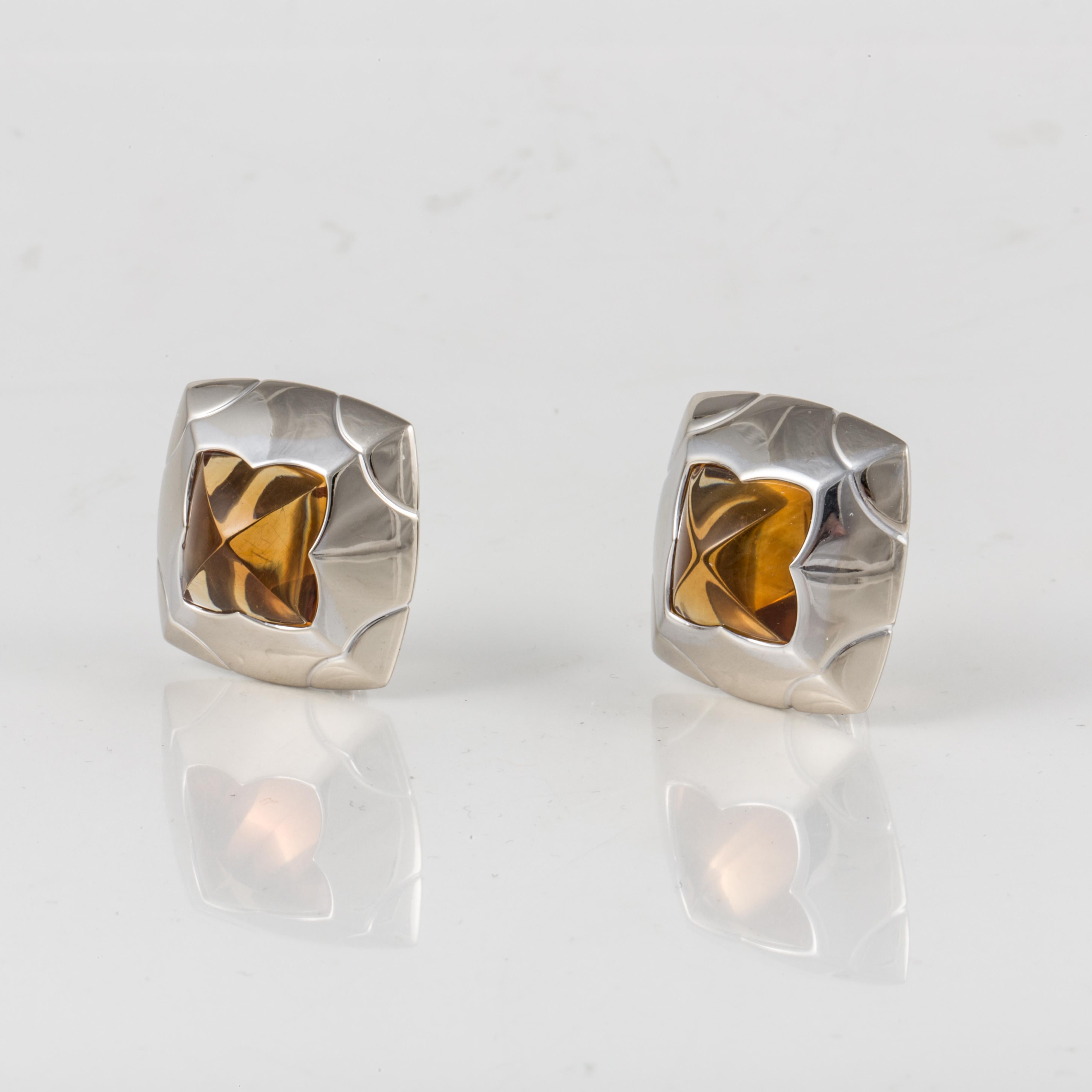 Bulgari Pyramide earrings in 18K white gold with citrine.  They measure 1 inch across, and are a clip style.