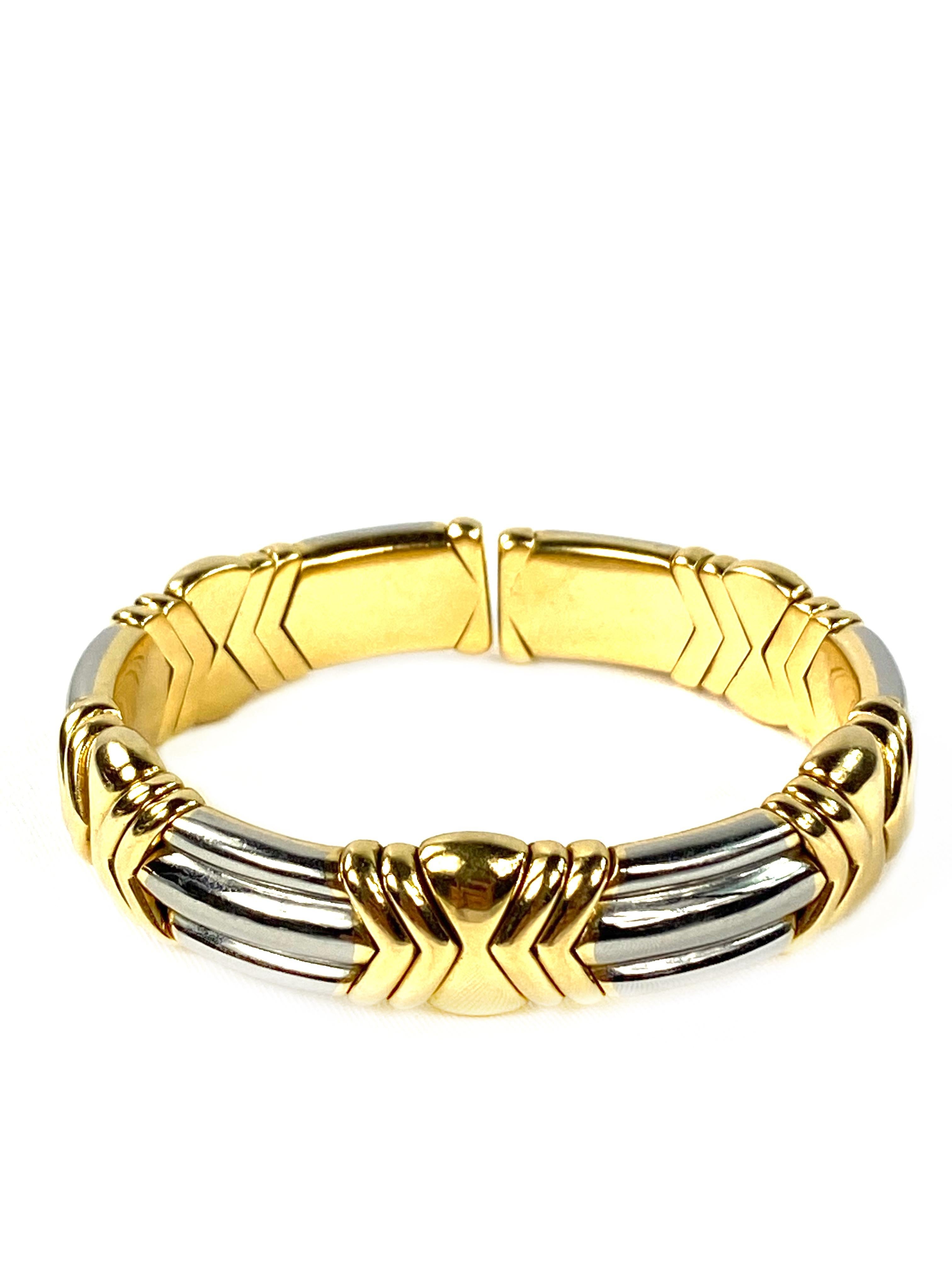 Product details:
Featuring flexible cuff bangle with 18K yellow gold geometric links and stainless steel ribbed links.
Signed BVLGARI, stamped 750, serial number is 7589.
Measurement: diameter is 3