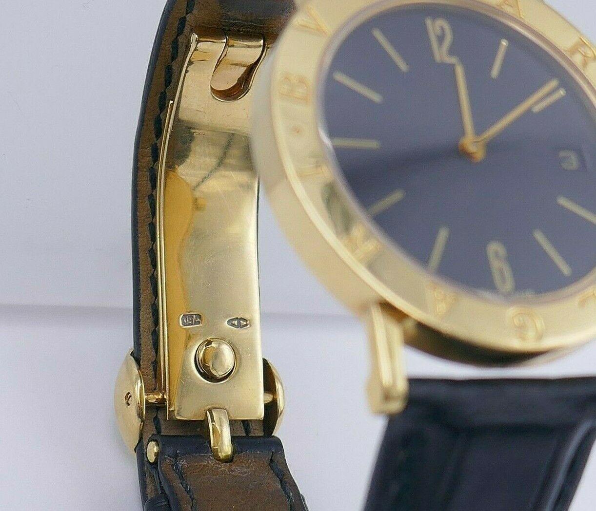 Bulgari Montre-bracelet BB33 en or jaune avec cadran noir et boucle déployante en cuir en vente 4