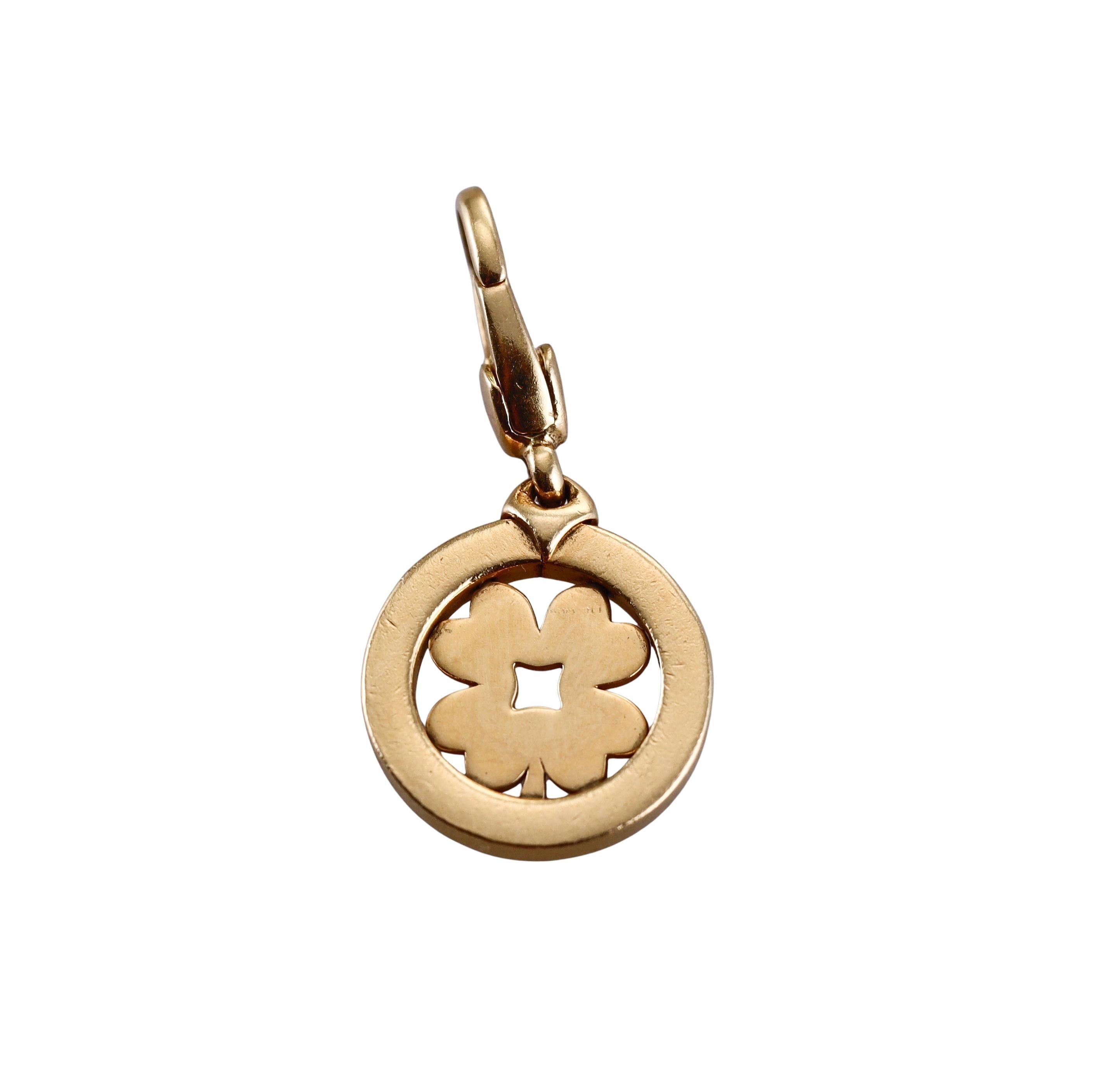 An 18k yellow gold charm pendant by Bvlgari depicting a clover. Pendant is 28mm long with bale and is 13mm in diameter. Marked Bvlgari, made in Italy, 750. Weight - 4 grams. 